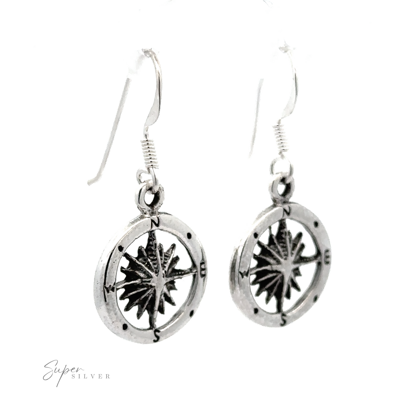 A pair of Compass Dangling Earrings featuring circular pendants with a compass cutout design, isolated against a white background.