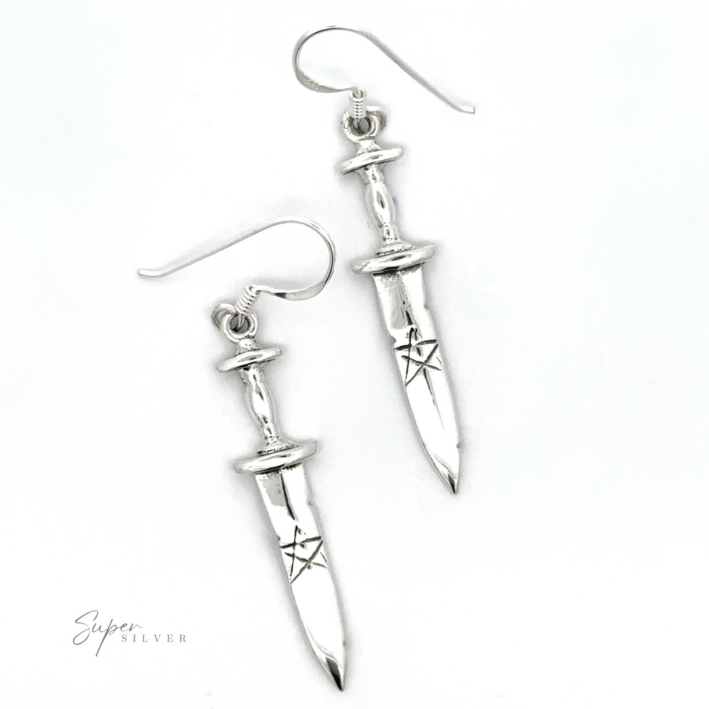 A pair of Dagger Earrings With Pentagram with intricate, gothic-style designs is shown against a white background. The "Super Silver" logo is visible at the bottom left corner of the image.