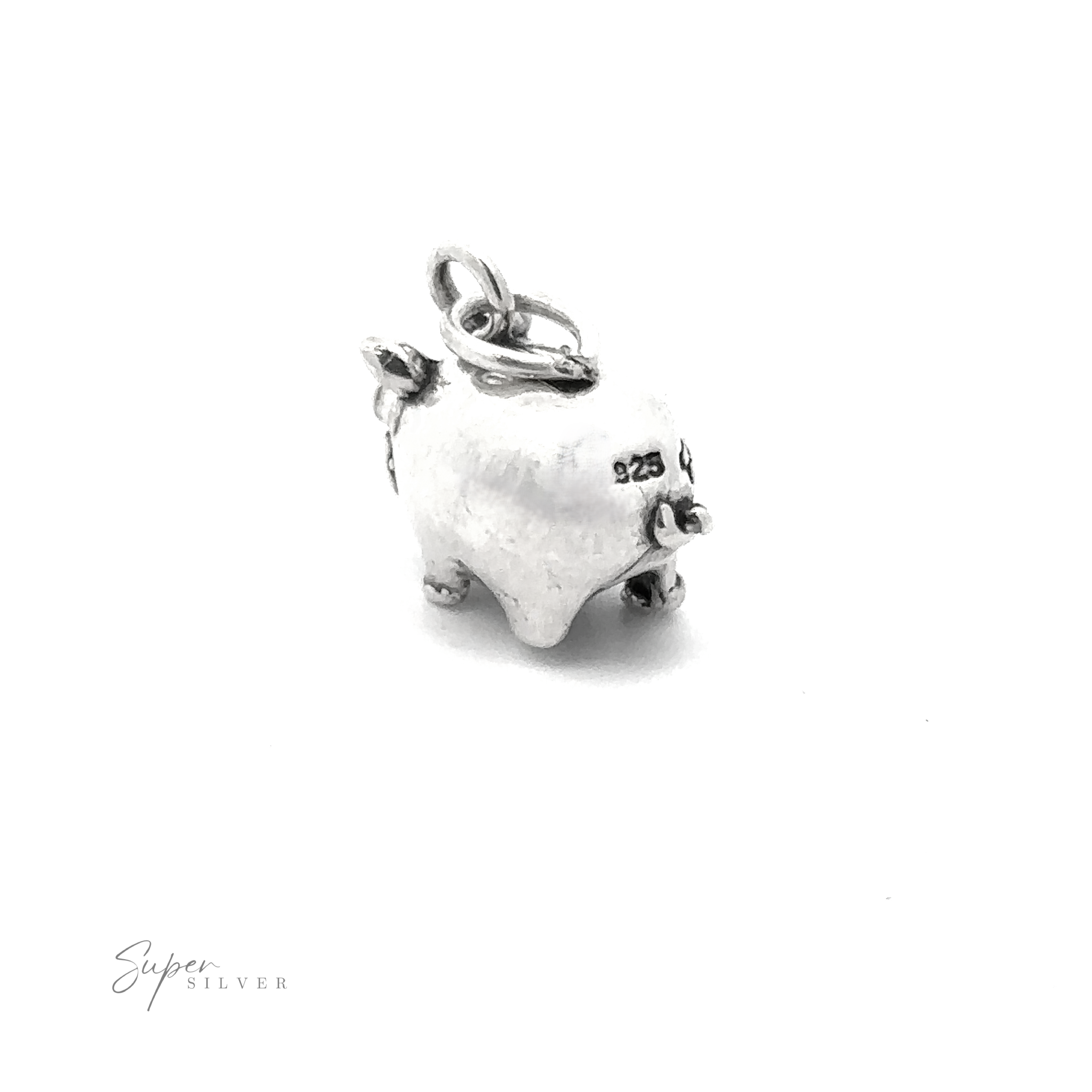 The Piggy Bank Charm is a small, chunky silver charm designed in the shape of a pig, complete with a loop for easy attachment. Made from high-quality .925 Sterling Silver, this playful piece of jewelry stands out against its plain white background.