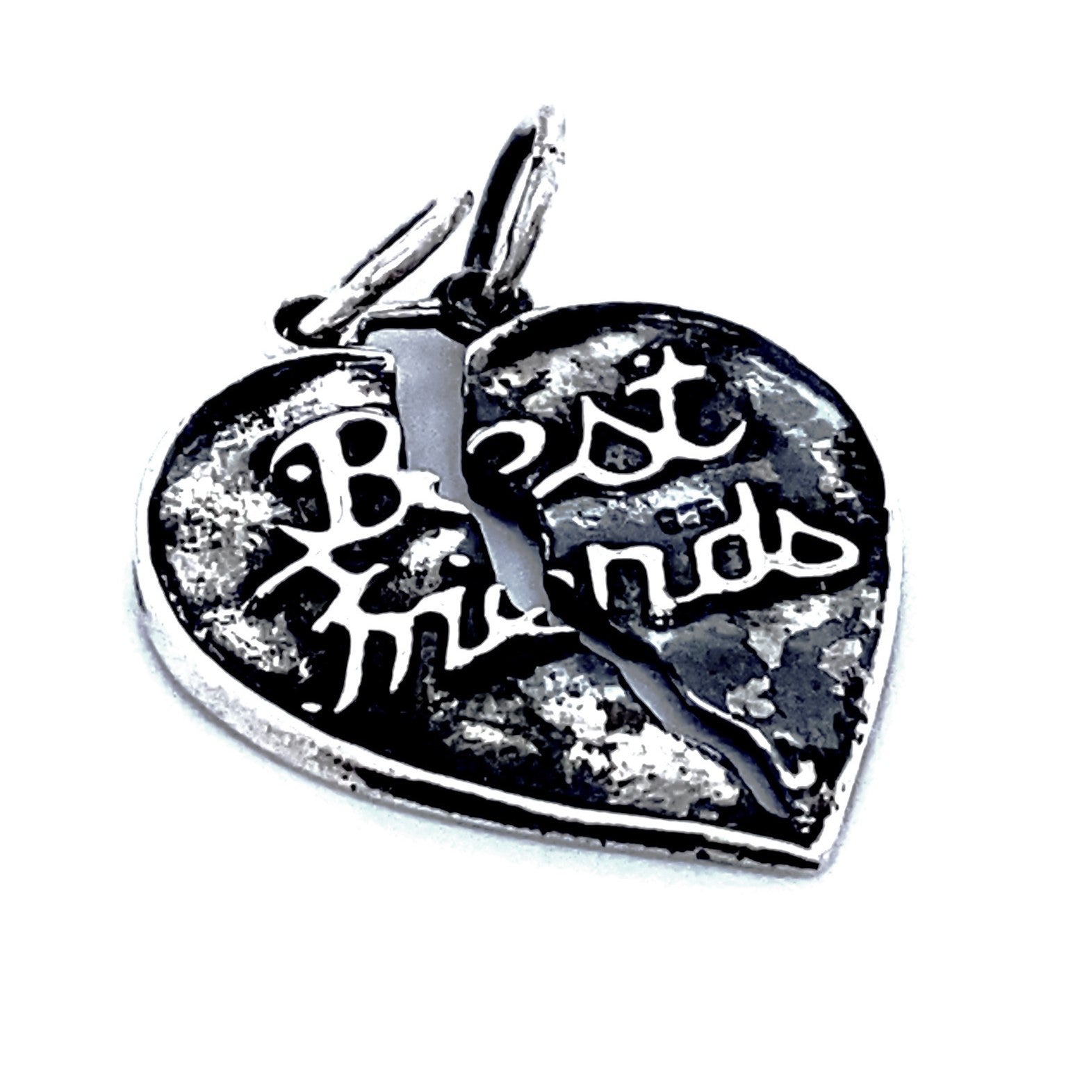 A "Best Friends" Break Apart Charm, with "Best Friends" engraved on each half.
