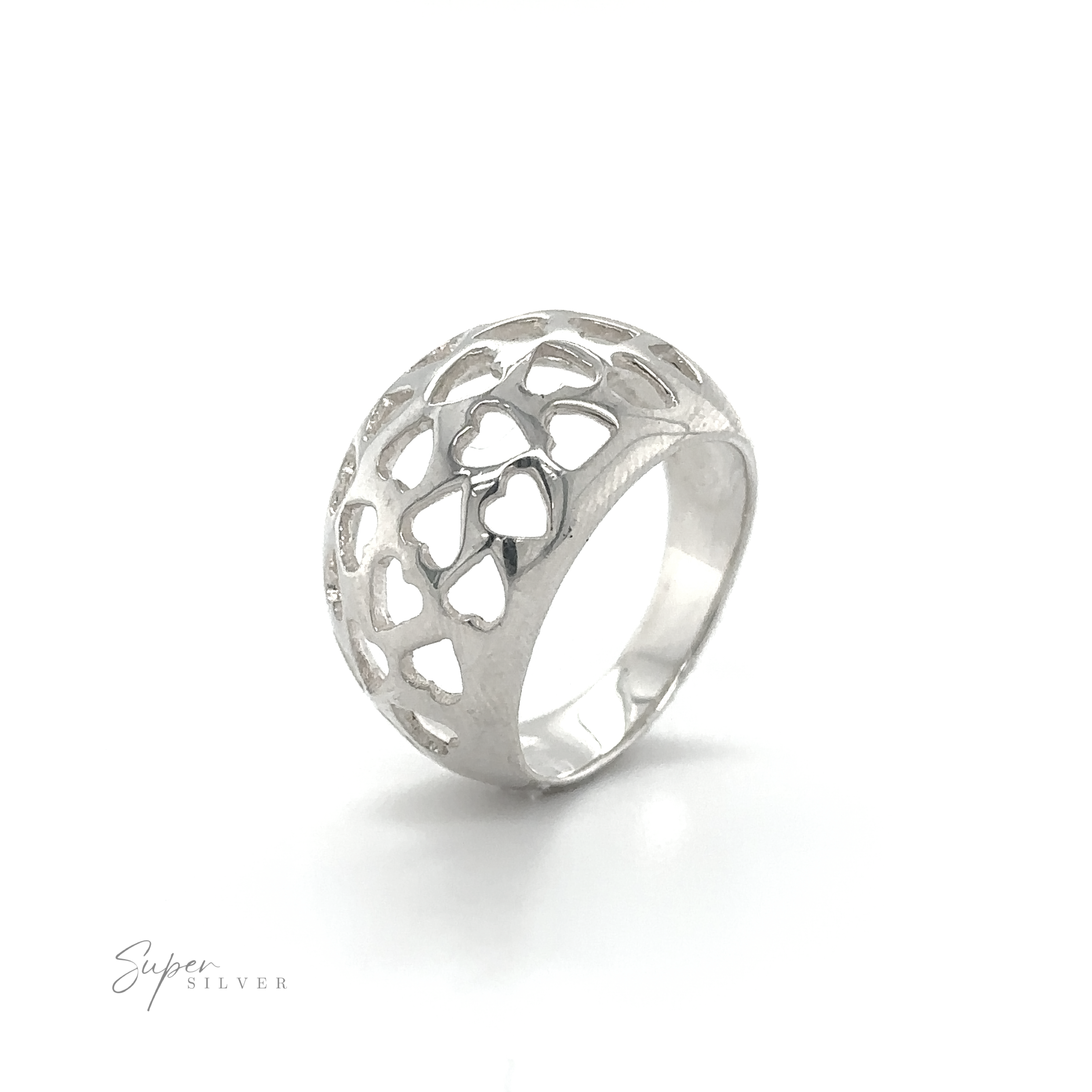 A Domed Ring Cut-Out Hearts with a delicate floral design, perfect for expressing love or as an engagement symbol.