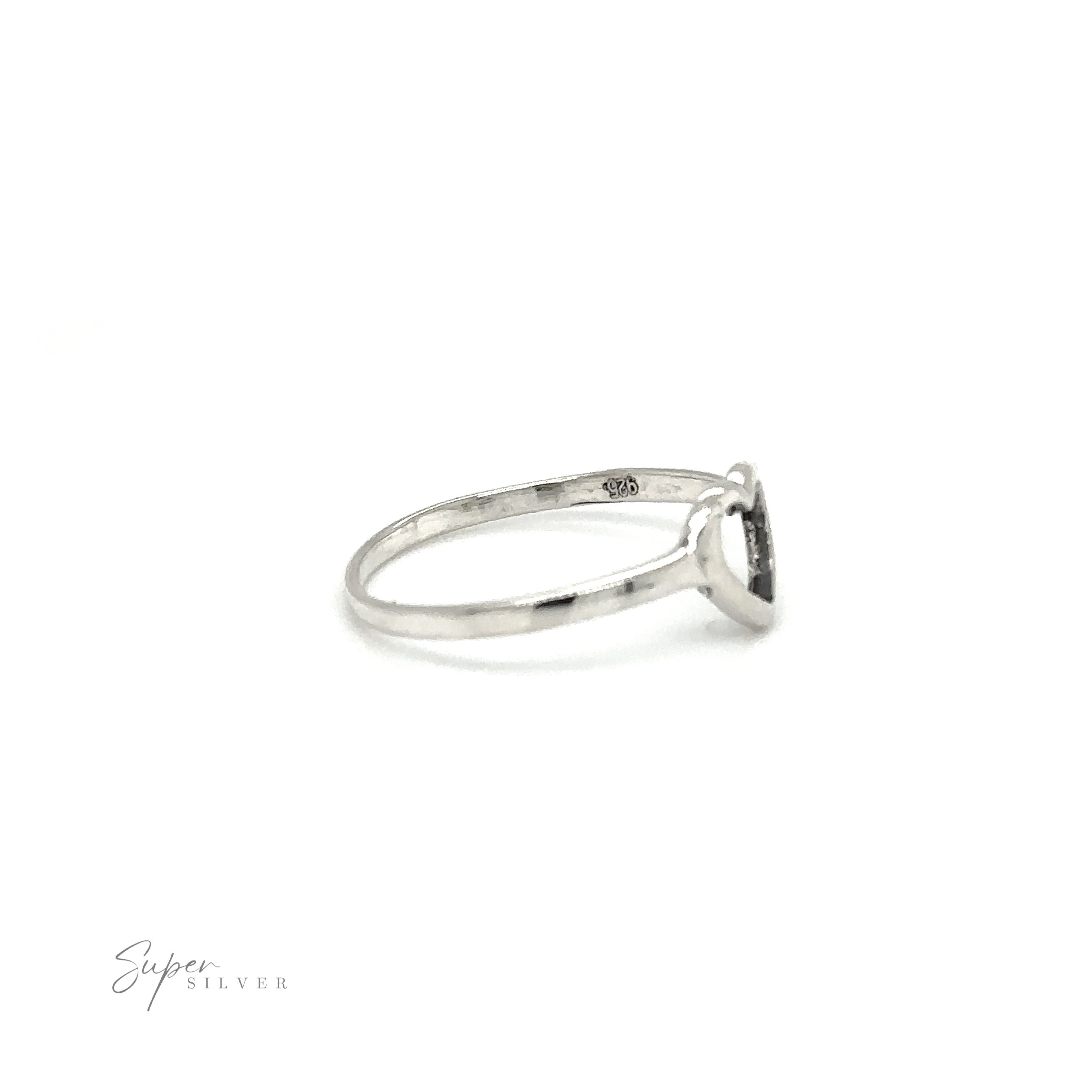 A delicate heart outline ring with a black stone in the middle, perfect for expressing love.