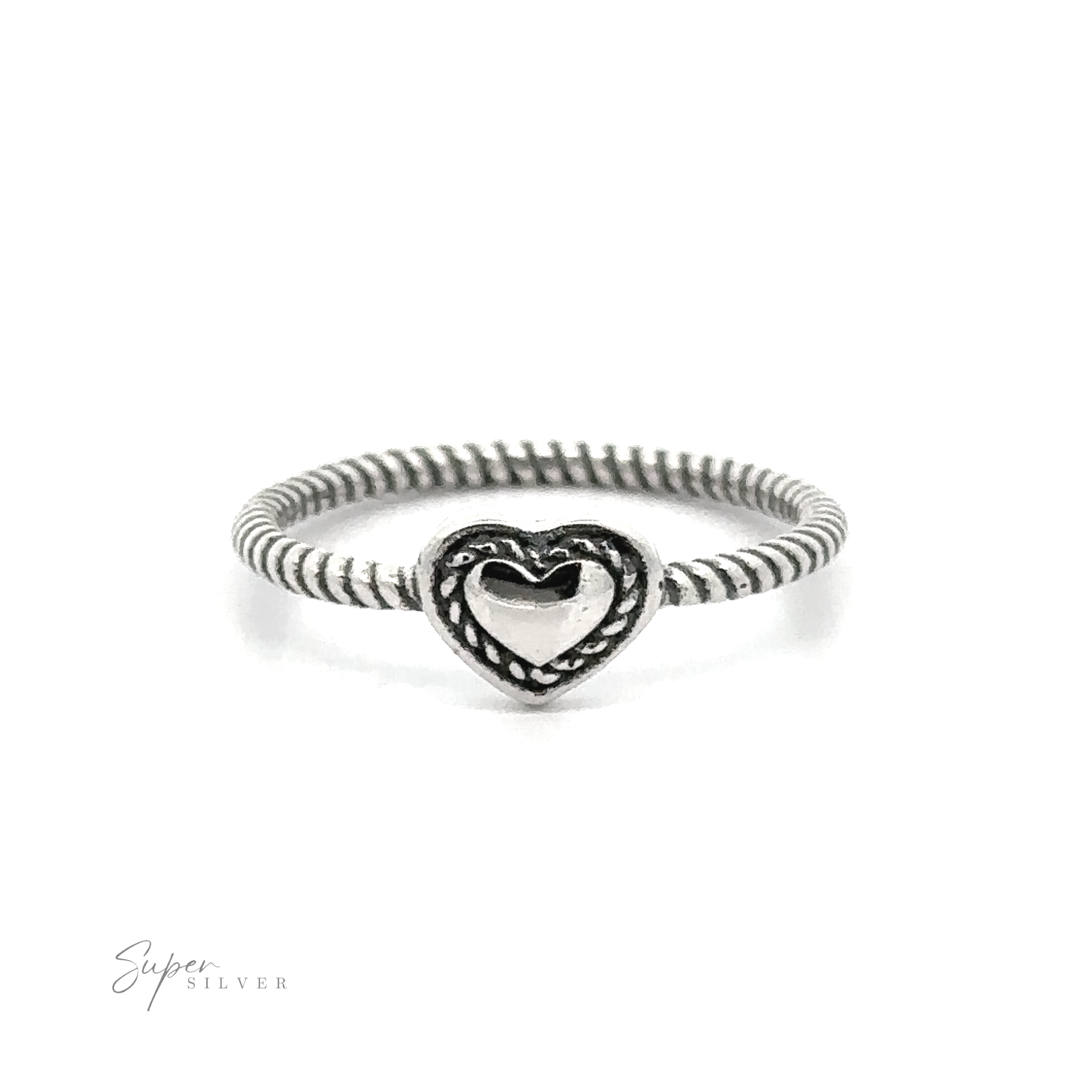 Oxidized Heart Ring with Twisted Band with a heart-shaped centerpiece featuring detailed engravings, displayed against a white background.
