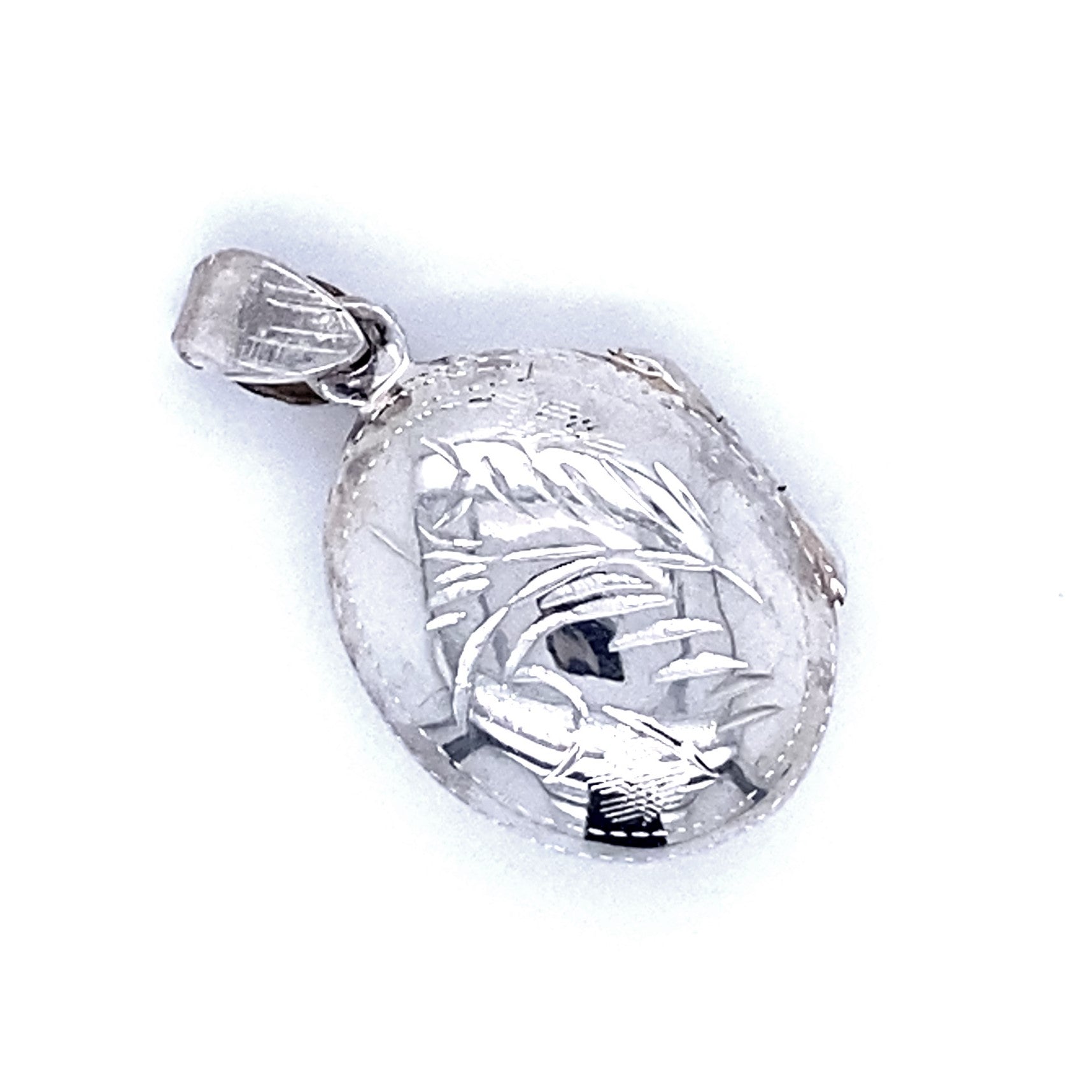 An Oval Locket with Plant Etching in an oval shape, adorned with an engraved fish design, and featuring a top loop for attaching to a necklace.