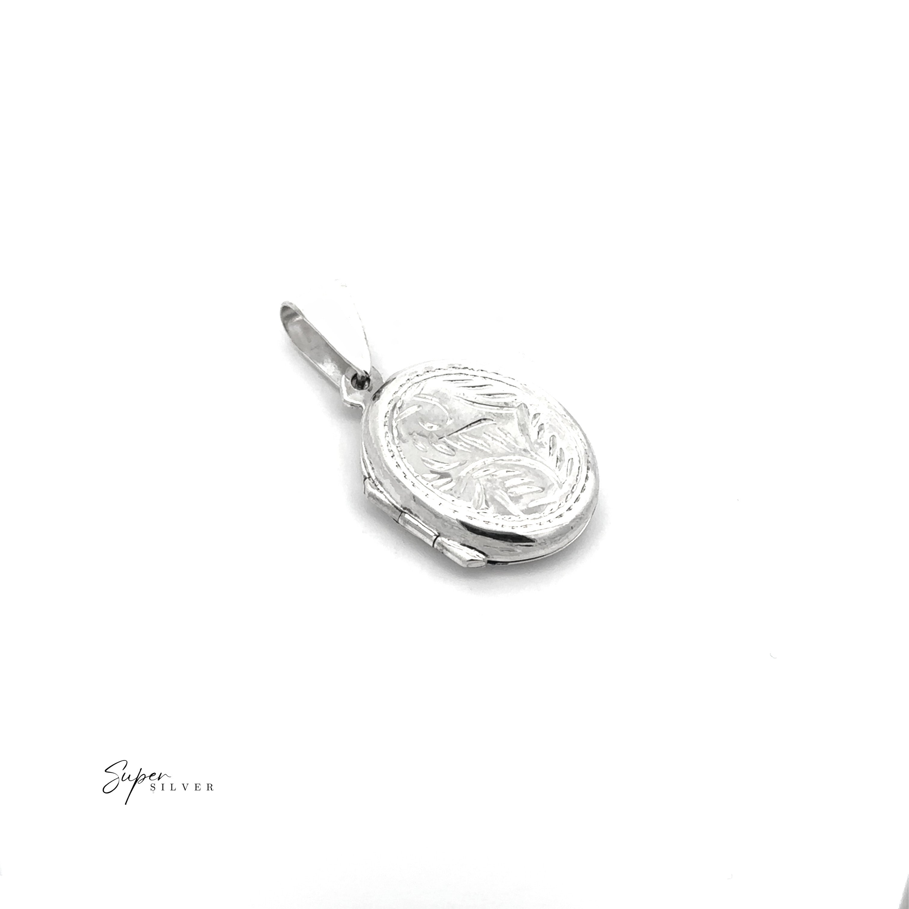 The Oval Locket with Vine Pattern is a sterling silver pendant featuring a raised vine design on white. Ideal for photo keepsakes, it displays the "Super Silver" logo in the bottom left corner.