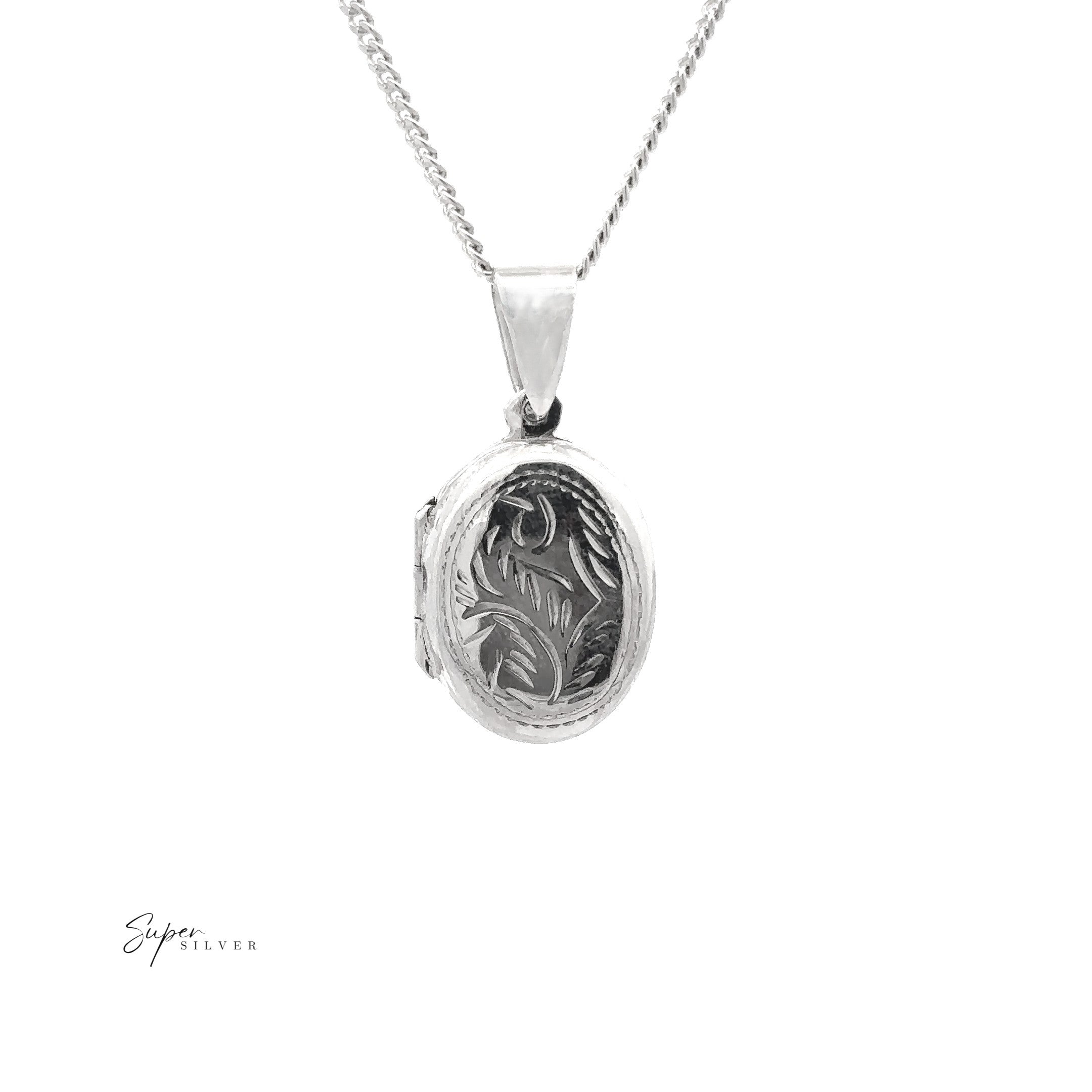 The Oval Locket with Vine Pattern is a vintage sterling silver pendant, ideal for photos, featuring an engraved vine design. It hangs from a thin chain and is shown on a plain white background.