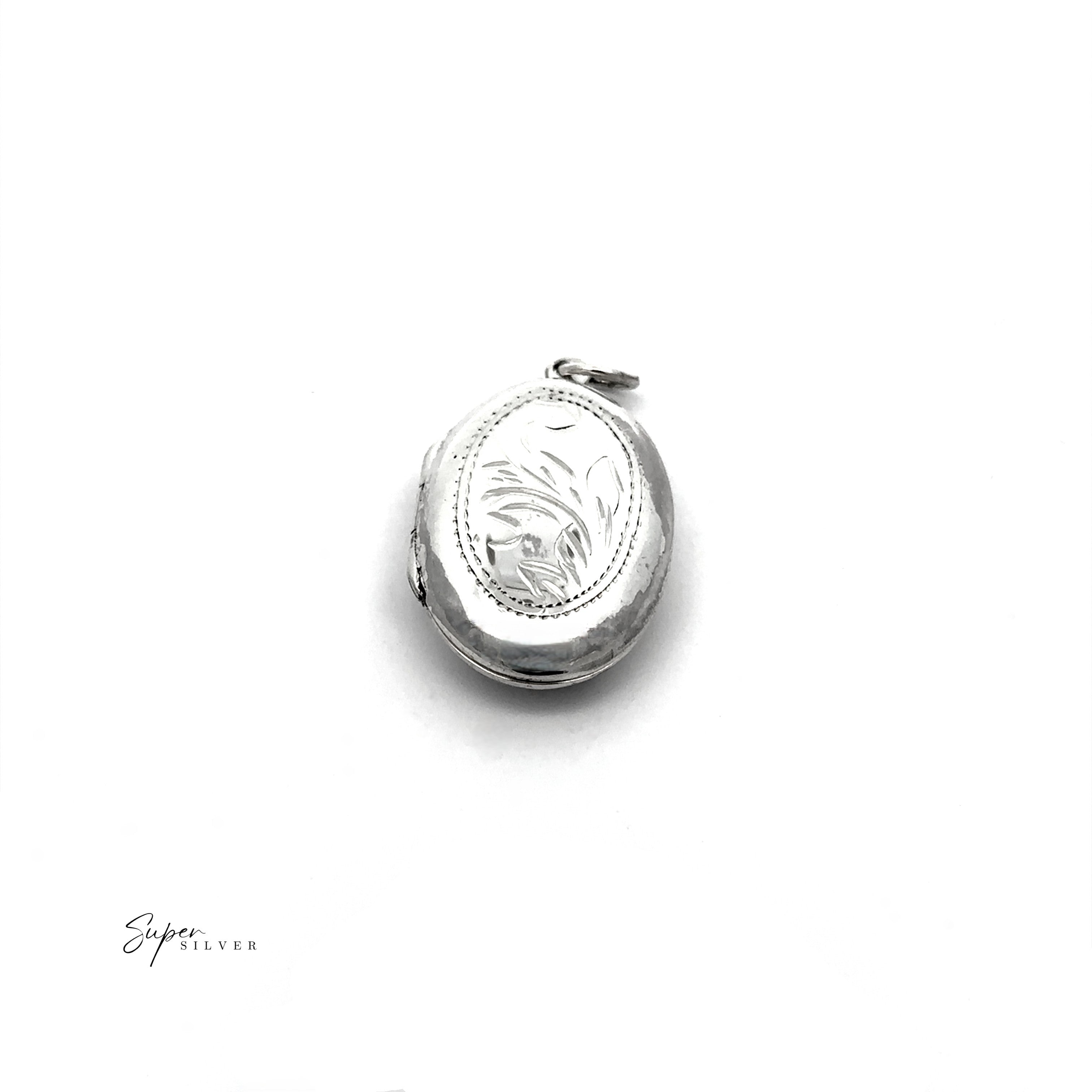 An Oval Silver Locket with Leaf Design, made of sterling silver and shown on a white background. "Super Silver" appears in the lower left, highlighting this elegant photo keepsake jewelry piece.