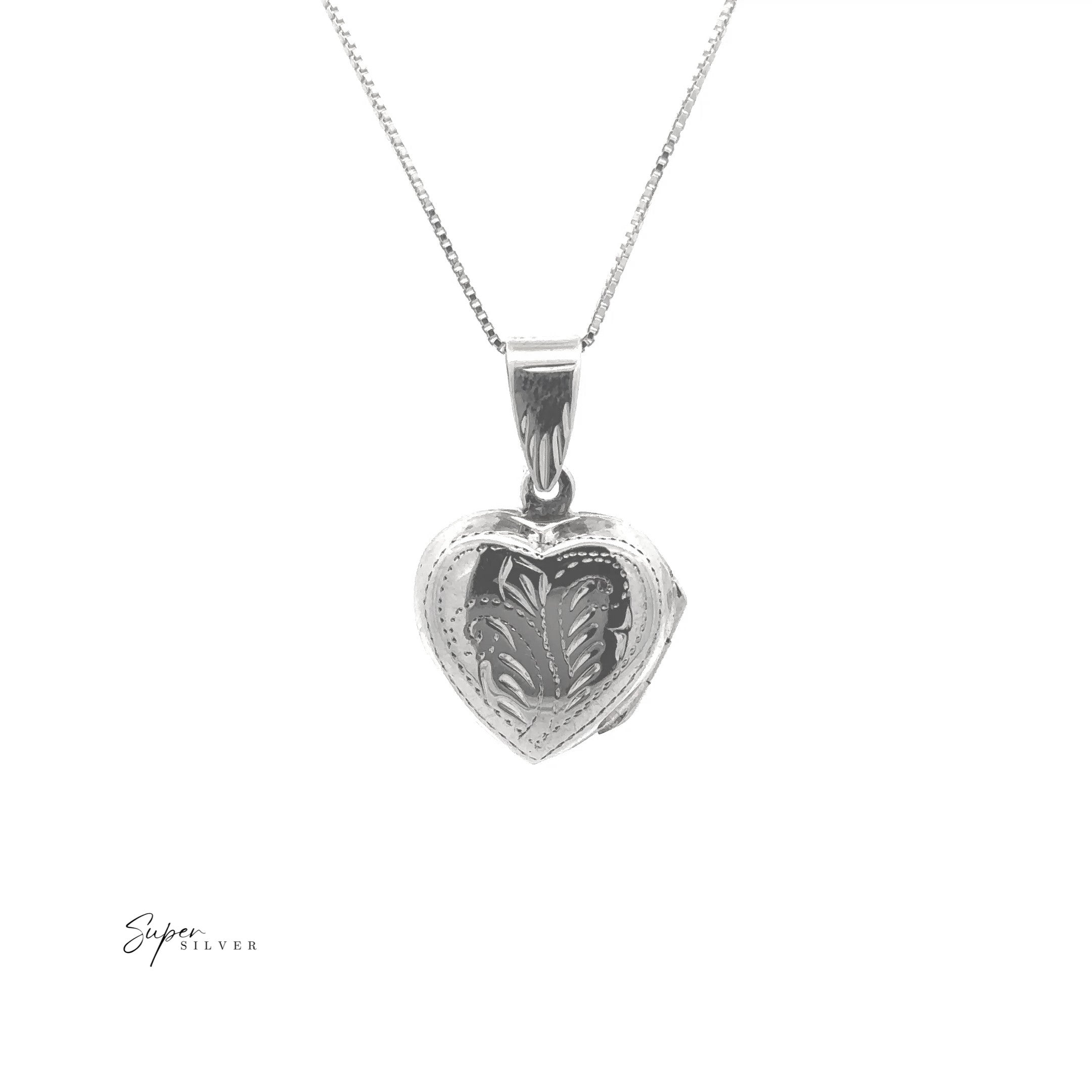 Tiny Heart-Shaped Lockets with Filigree Etching displayed on a fine chain against a white background.