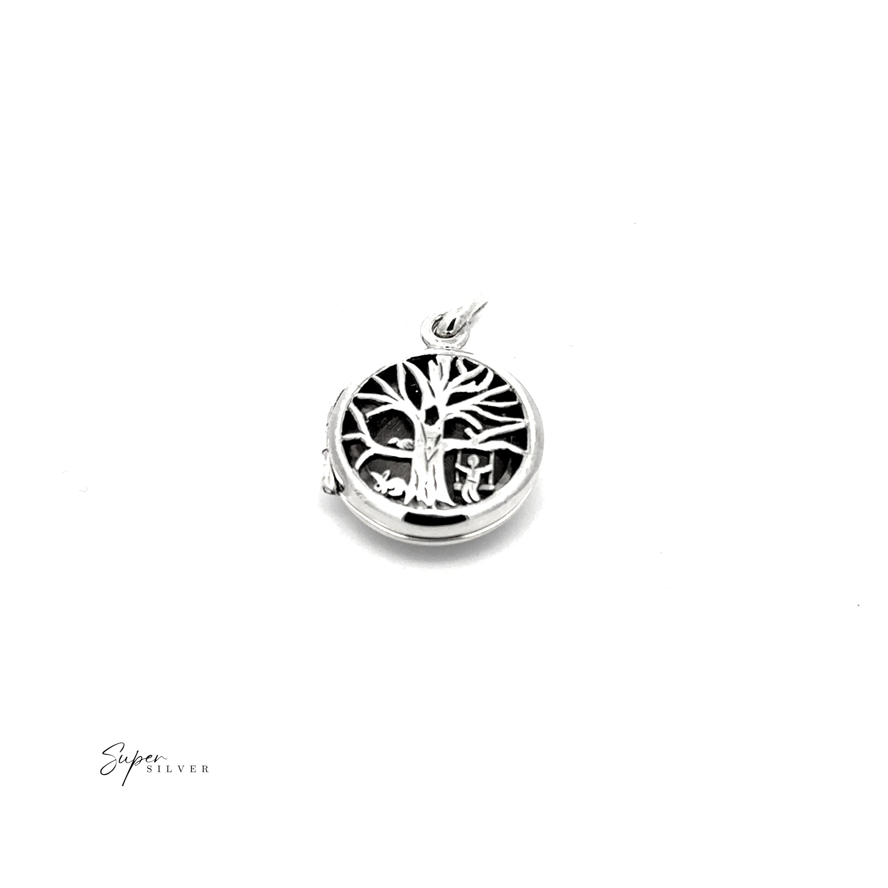 Round silver locket pendant called Tree Locket with Swinging Child, crafted in .925 sterling silver with a tree of life design. Photographed on a white background, the Super Silver logo appears in the lower left corner.