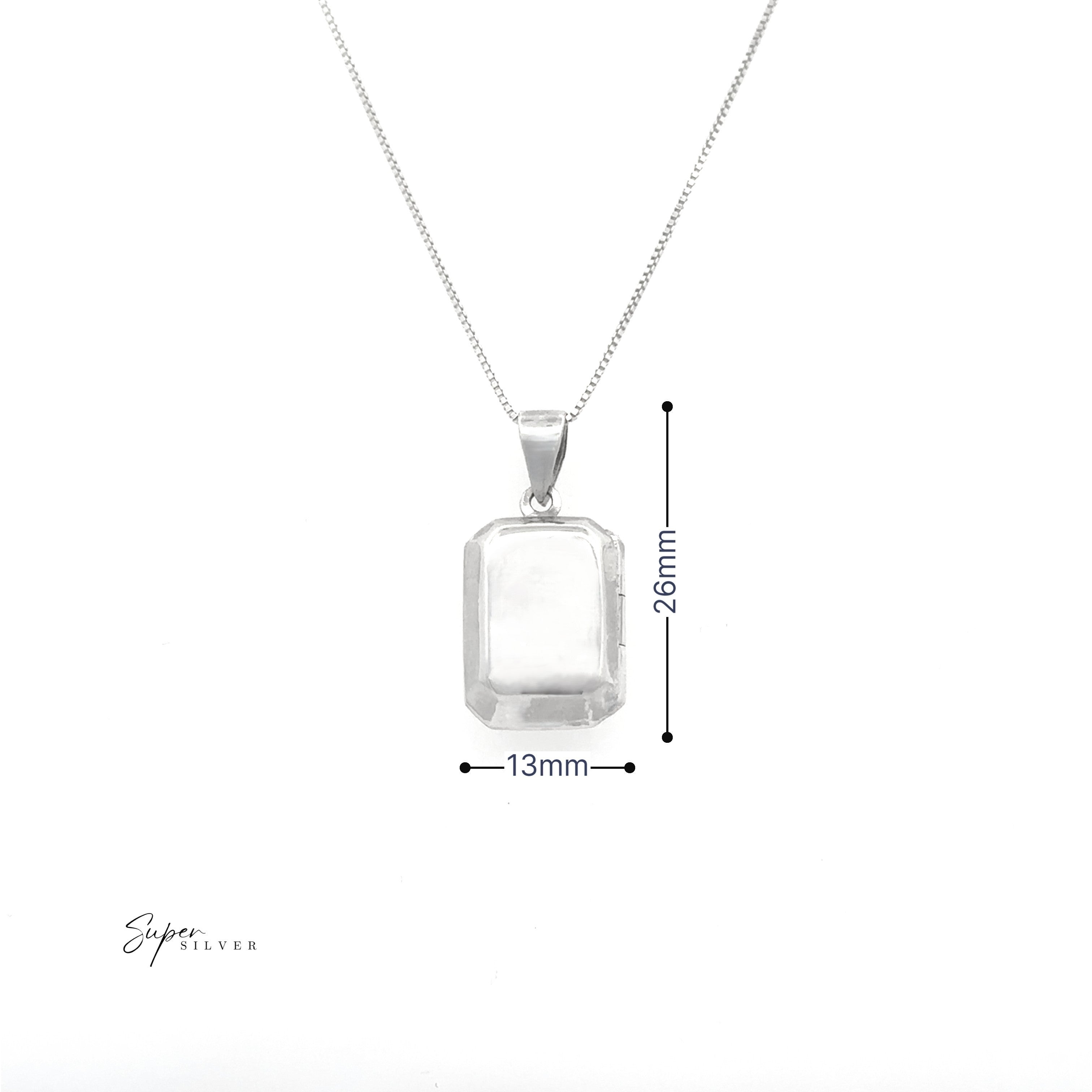The Beveled Edge Rectangular Locket is a sterling silver necklace with a minimalist 26mm x 13mm rectangular pendant, shown on a white background.