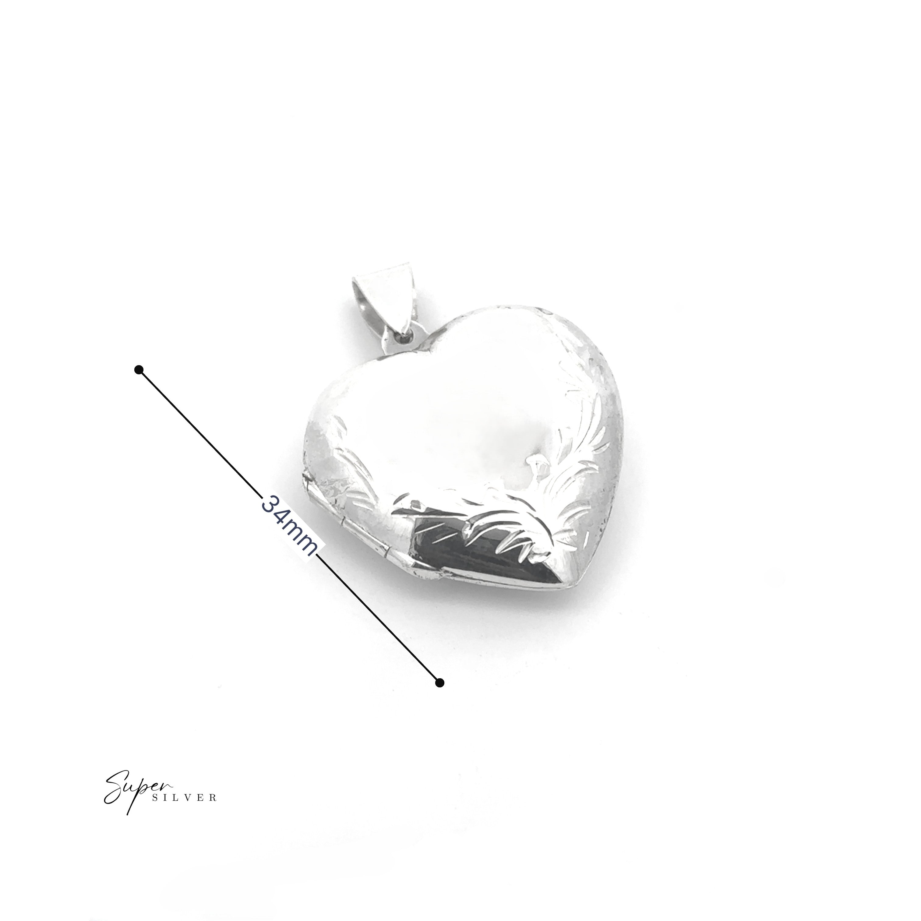 The Heart Locket with Filigree Border features an elegant engraved silver heart design, measures 34mm diagonally, and is ideal for personalization. "Super Silver" logo is displayed in the bottom left corner.
