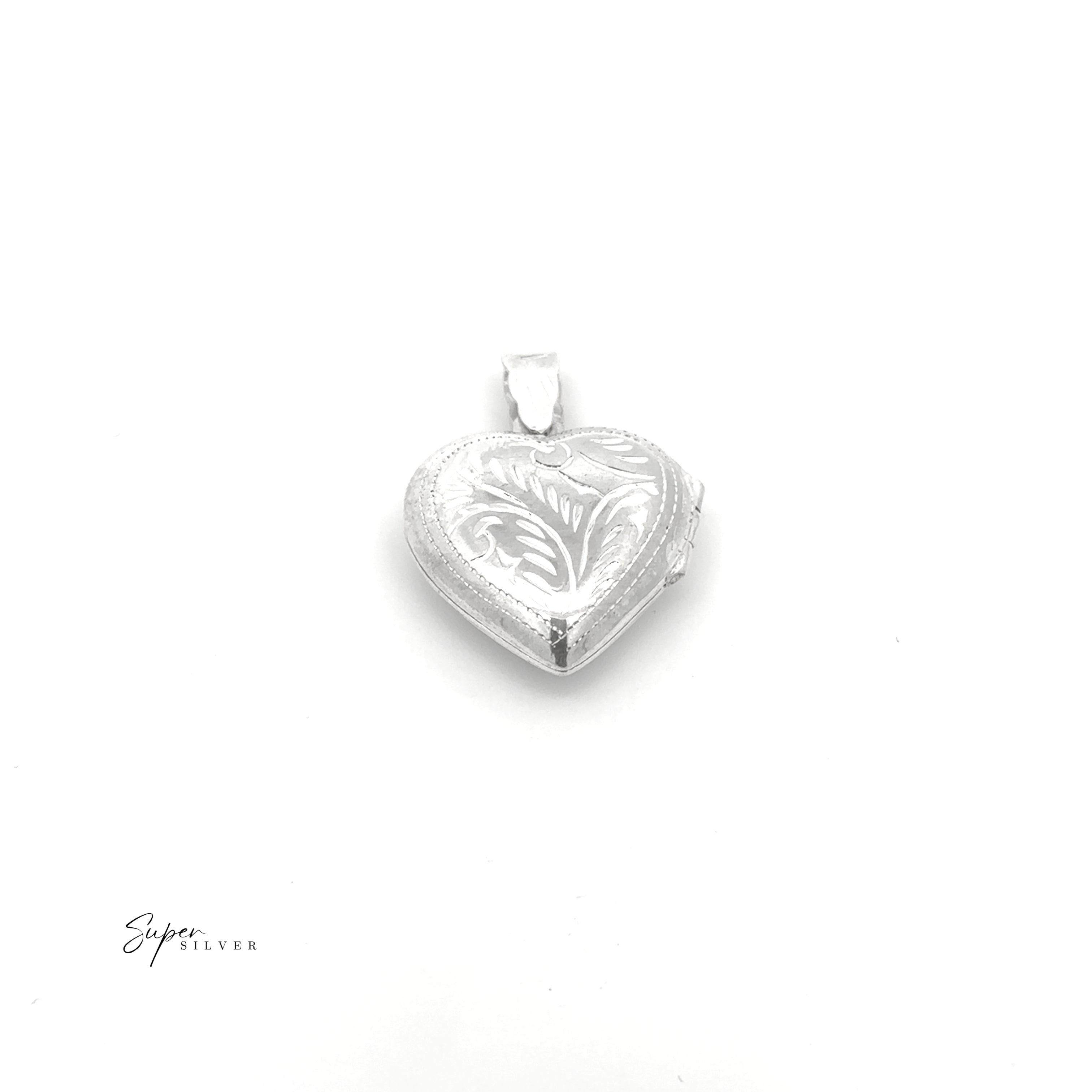 The Timeless Heart Locket, a sterling silver heart-shaped locket with engraved leaf patterns and vintage charm, is displayed against a plain white background. The "Super Silver" logo appears in the bottom left corner.