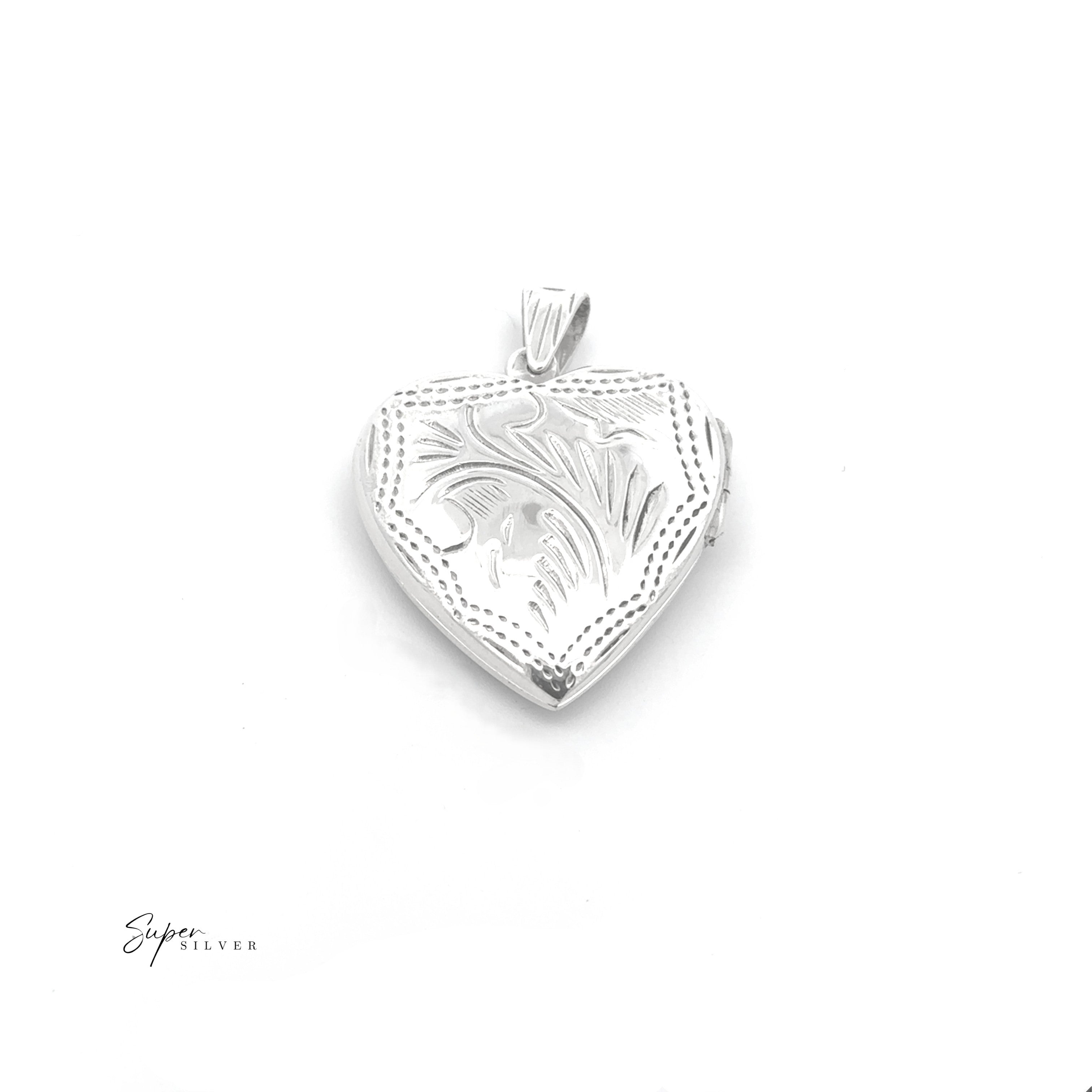 The Timeless Heart Locket, crafted in sterling silver with engraved floral and leaf details for vintage charm, is shown against a plain white background.