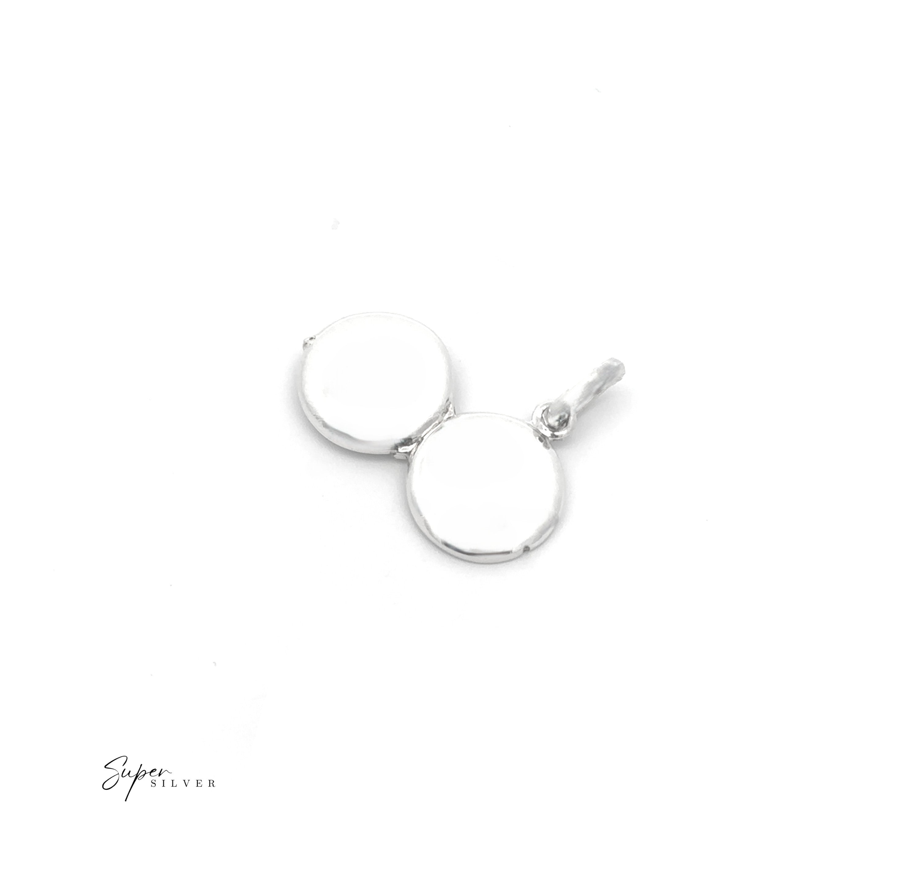 Simple Mini Lockets: Sterling Silver round double-disc pendant with a small loop for chains, displayed on a white background. Ideal for keepsakes. "Super Silver" appears in the bottom left corner.