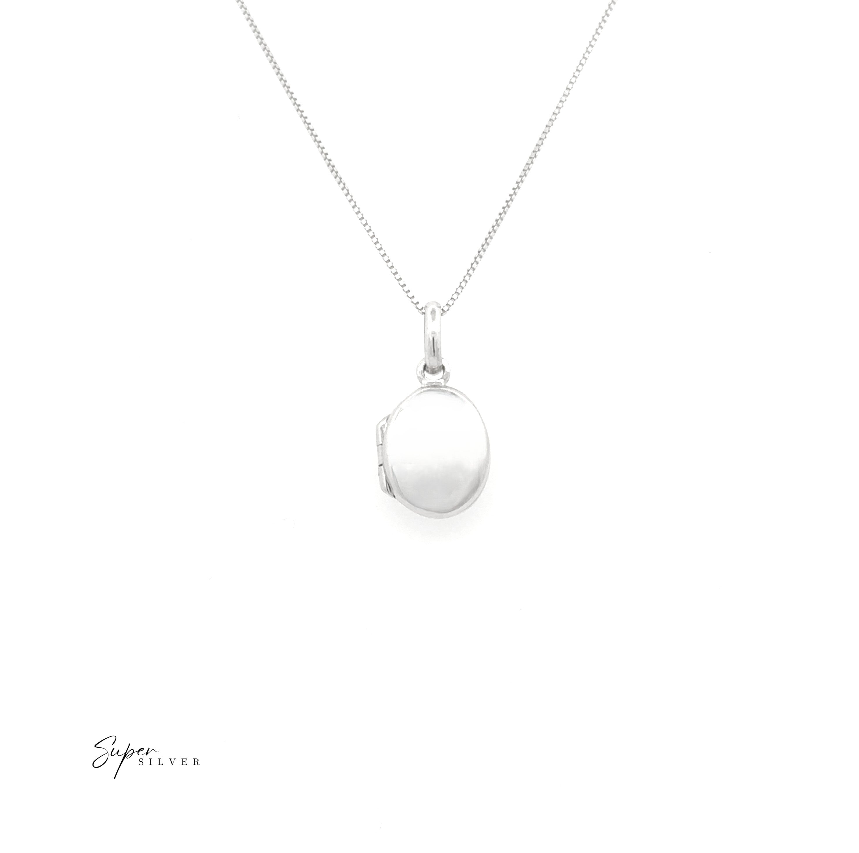 The Simple Mini Lockets pendant, a sterling silver oval locket on a fine chain for keepsakes, is shown on a white background with the "Super Silver" logo in the bottom left corner.