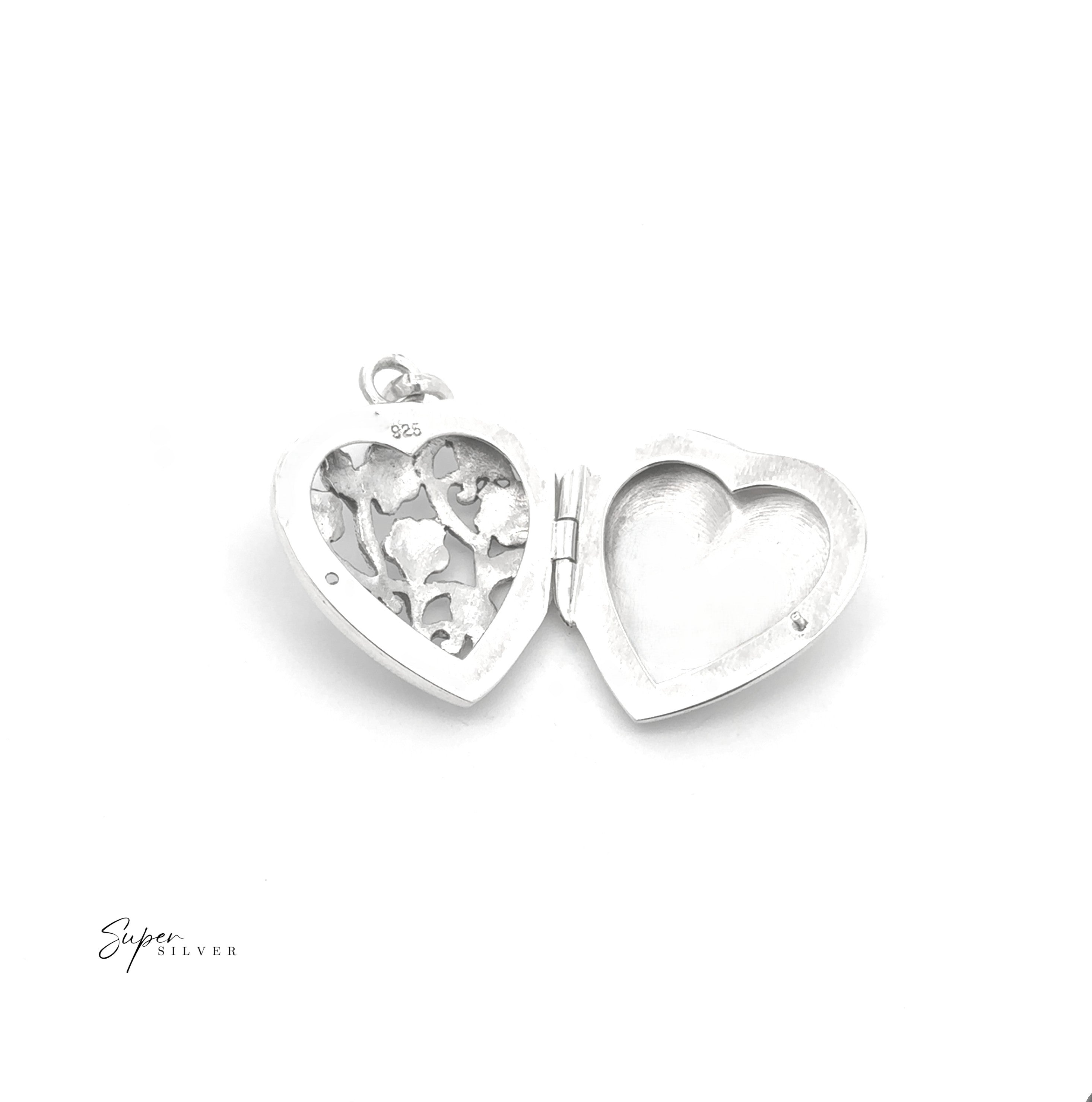 The Floral Open Lockets are vintage sterling silver, heart-shaped lockets with a delicate floral cutout on one side and a plain surface on the other, shown against a white background.