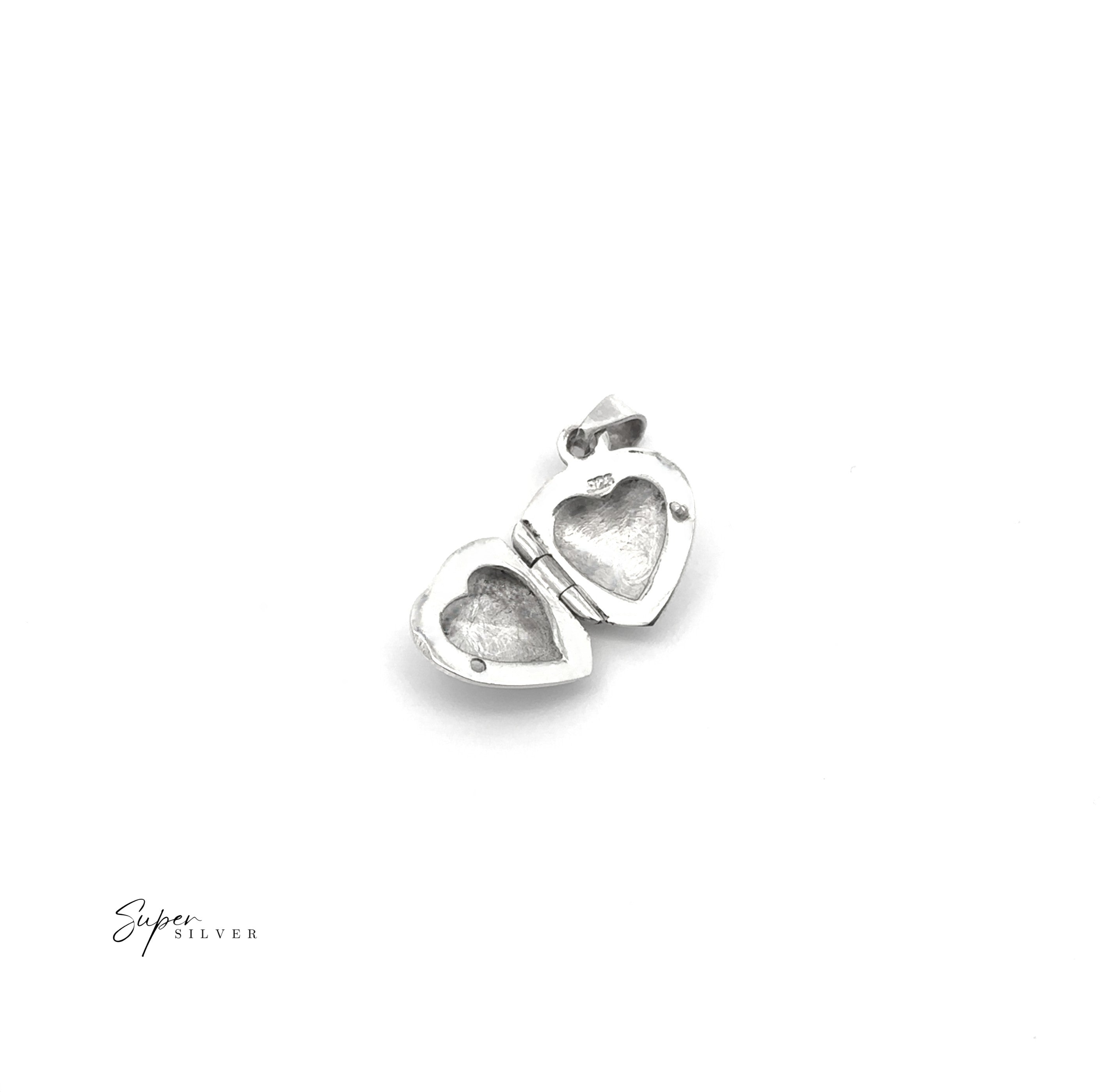 The Plain Heart Lockets is a silver, heart-shaped locket pendant with two empty compartments for keepsakes. Displayed on a white background, it features the text "Super Silver" in the corner.