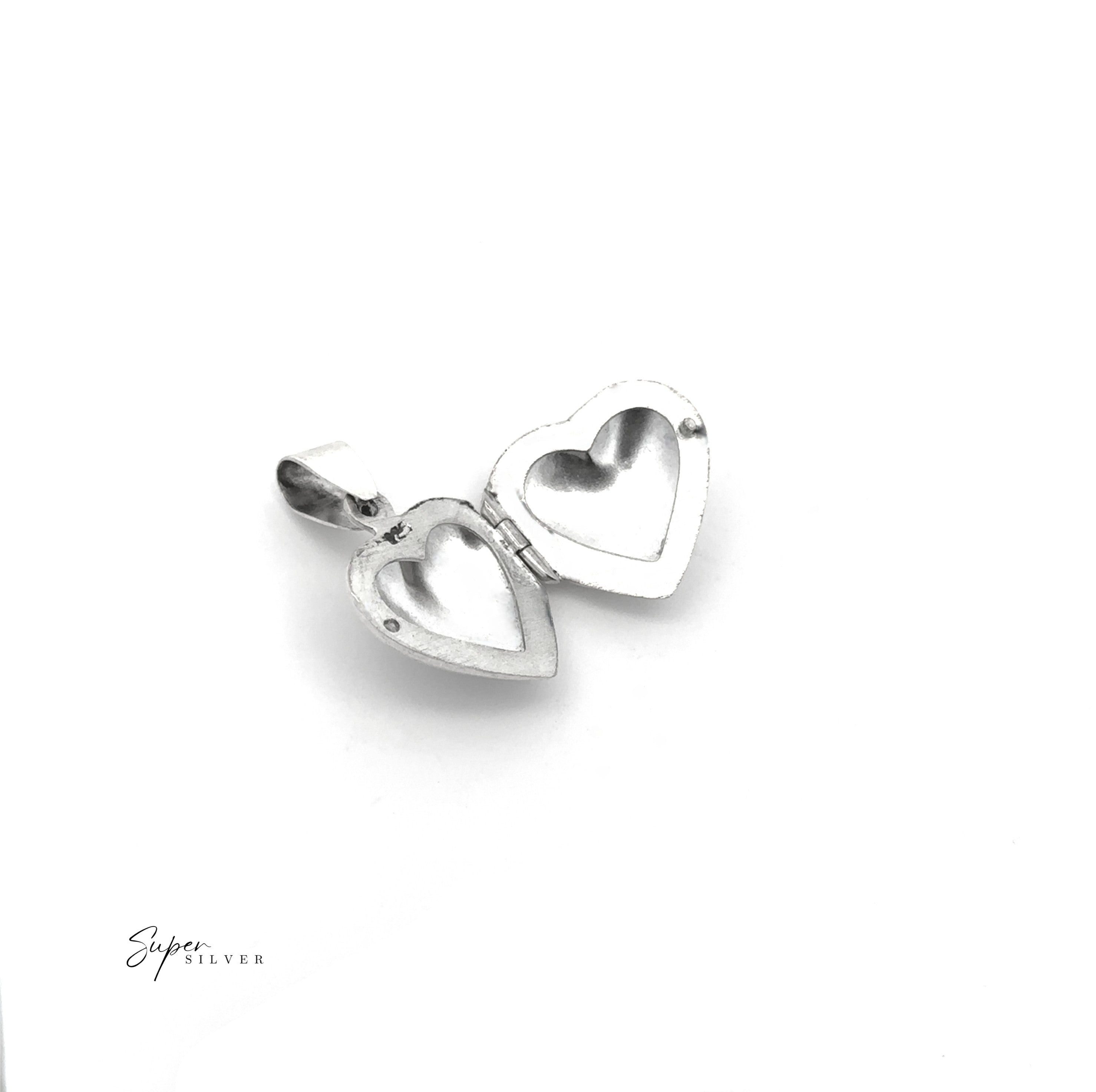 Plain Heart Lockets crafted in sterling silver with empty compartments, displayed on a white background—an elegant piece of tribute jewelry designed to keep cherished memories close.