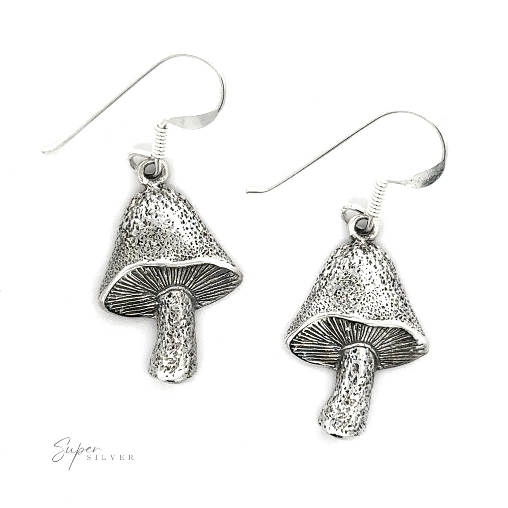 A pair of Textured Mushroom Earrings with detailed textures and an oxidized finish is shown. The "Super Silver" logo is visible at the bottom left.