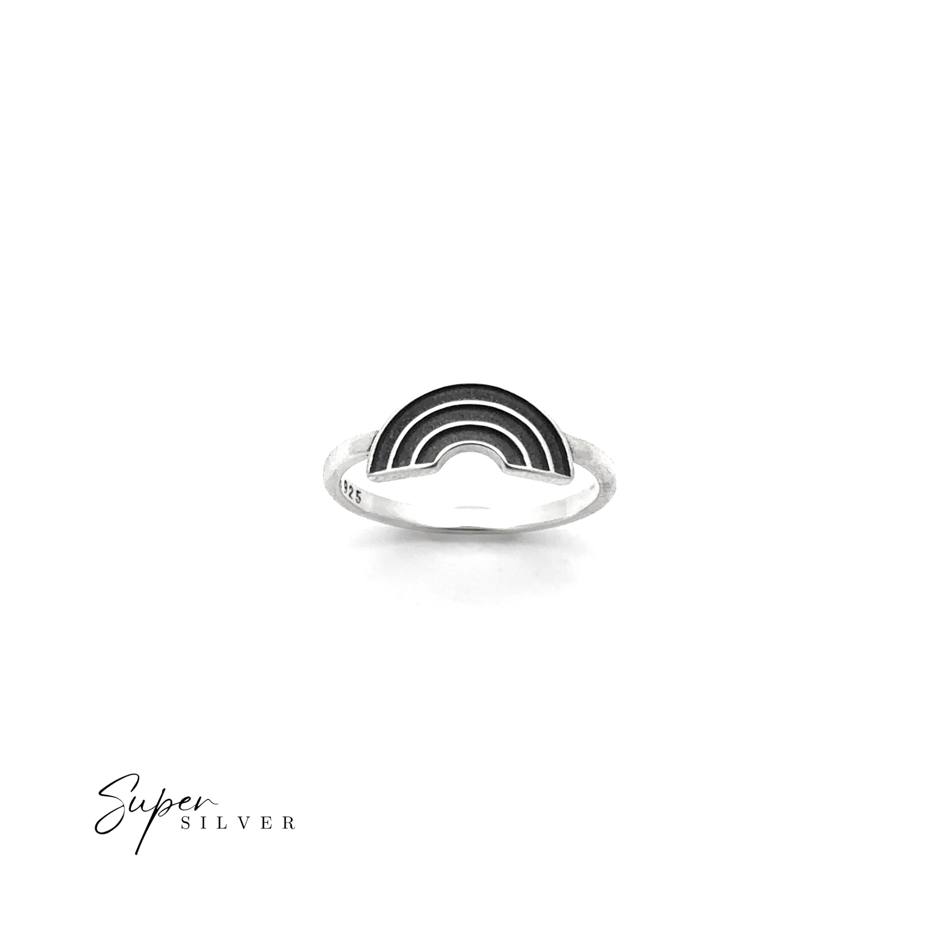 The Rainbow Ring: a minimalist sterling silver band with a rainbow design, shown on a white background with "Super Silver" in the corner—a subtle symbol of love.