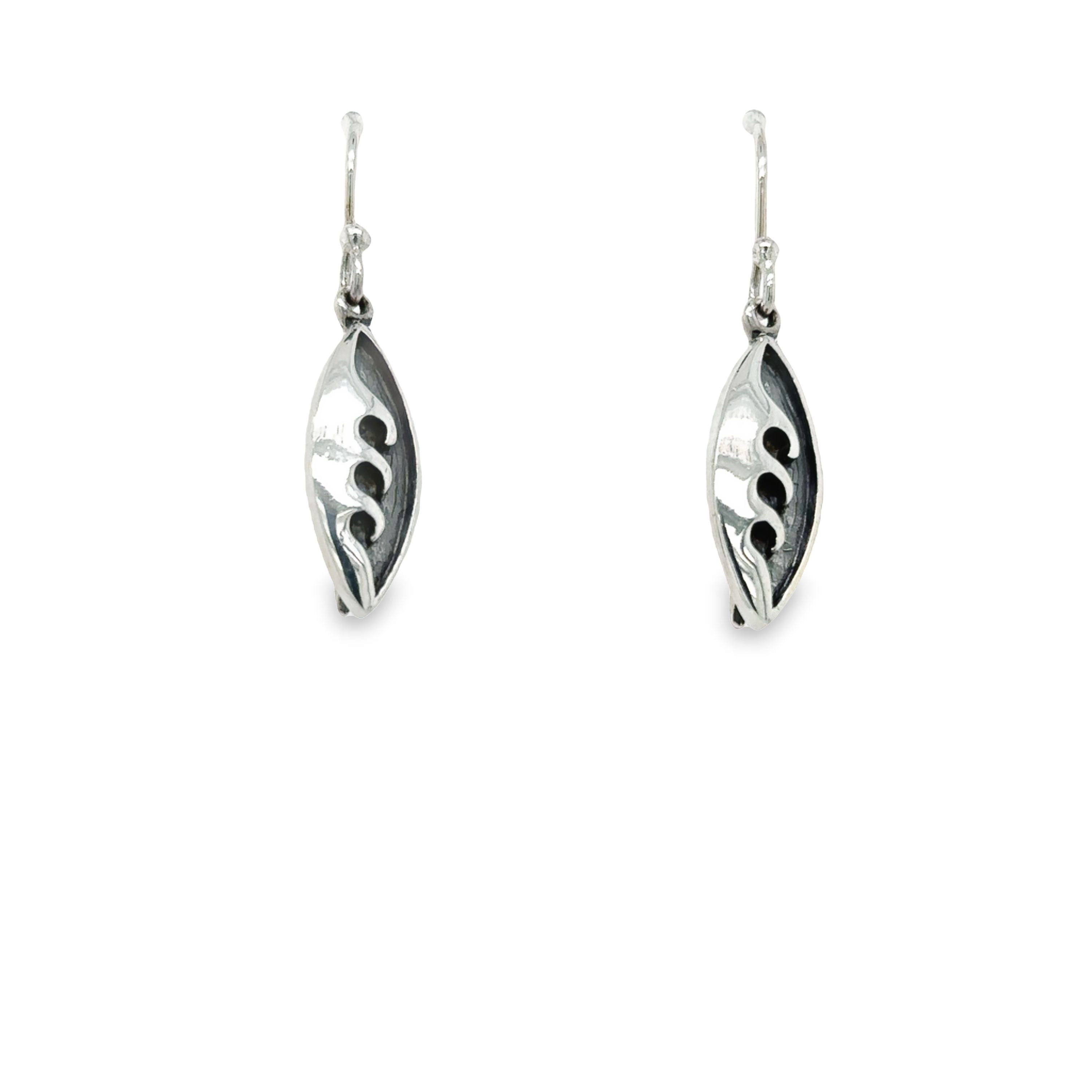 A pair of Super Silver Surfboard Earrings with Wave Detail and leaves on them.