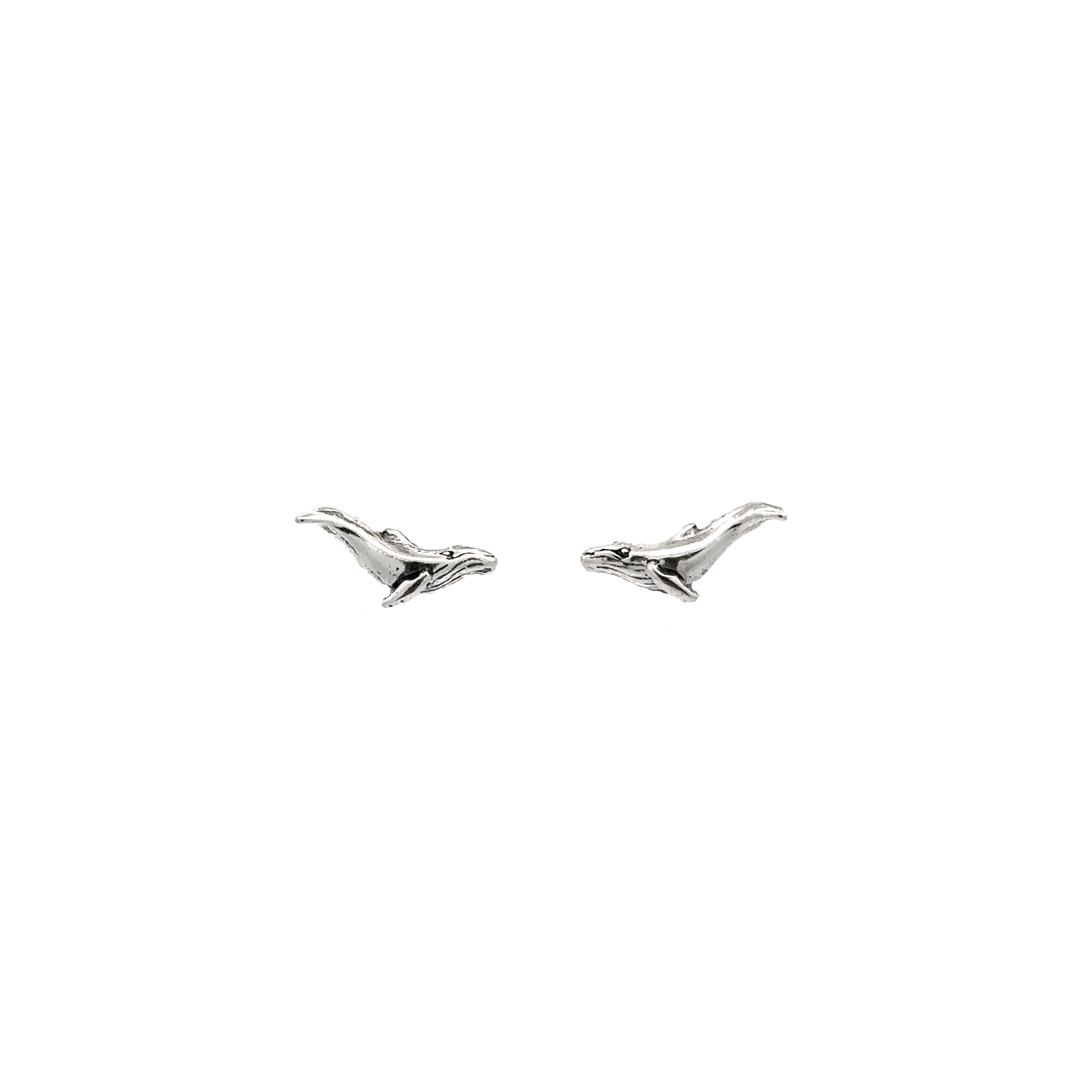 A pair of .925 Sterling Silver Whale Studs on a white background.