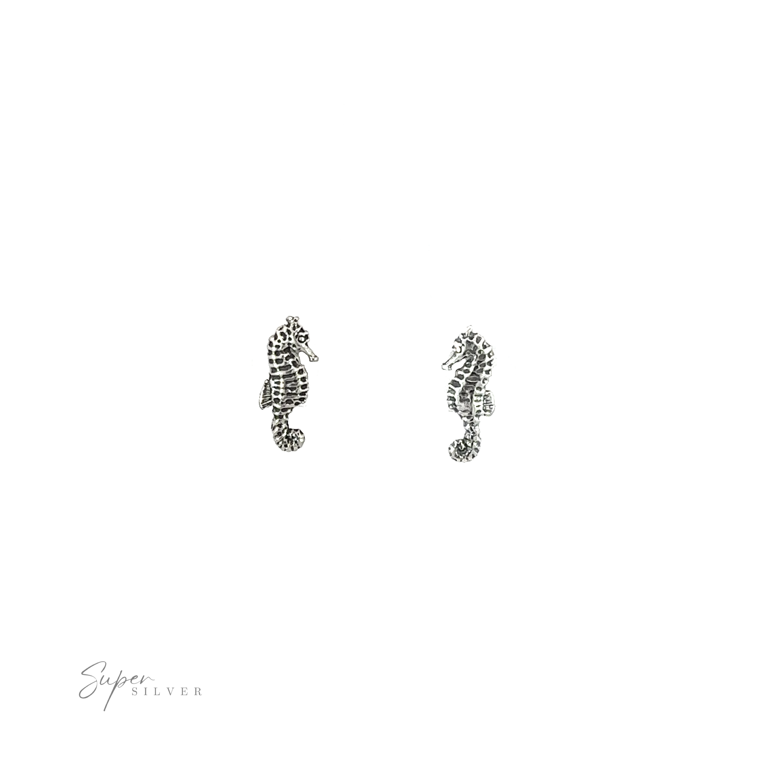 Delicate details showcase a pair of Seahorse Studs, ocean creatures that elegantly adorn against a serene white background.