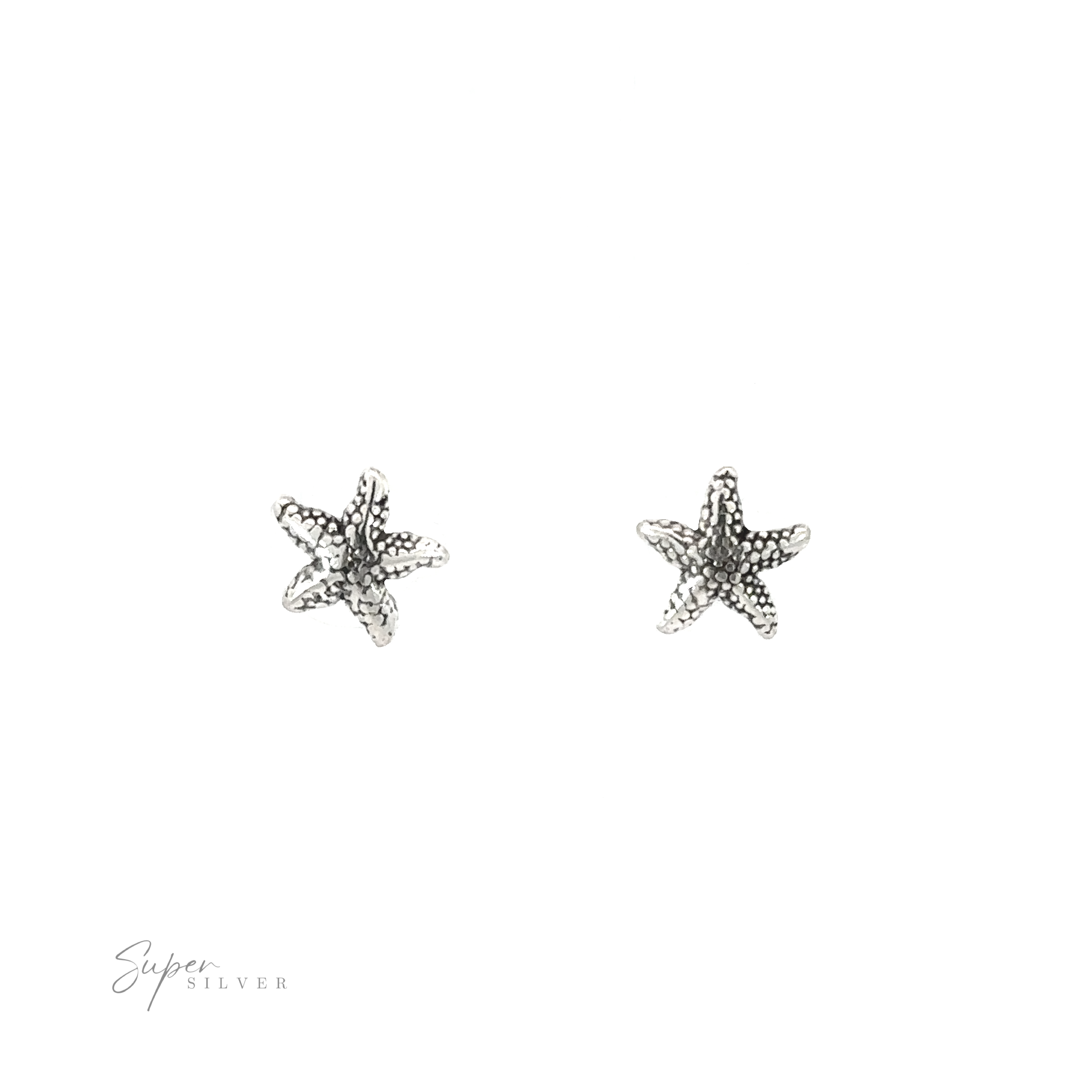 A pair of Star Fish Studs, perfect for coastal living or beach shore enthusiasts, showcased on a pristine white background.