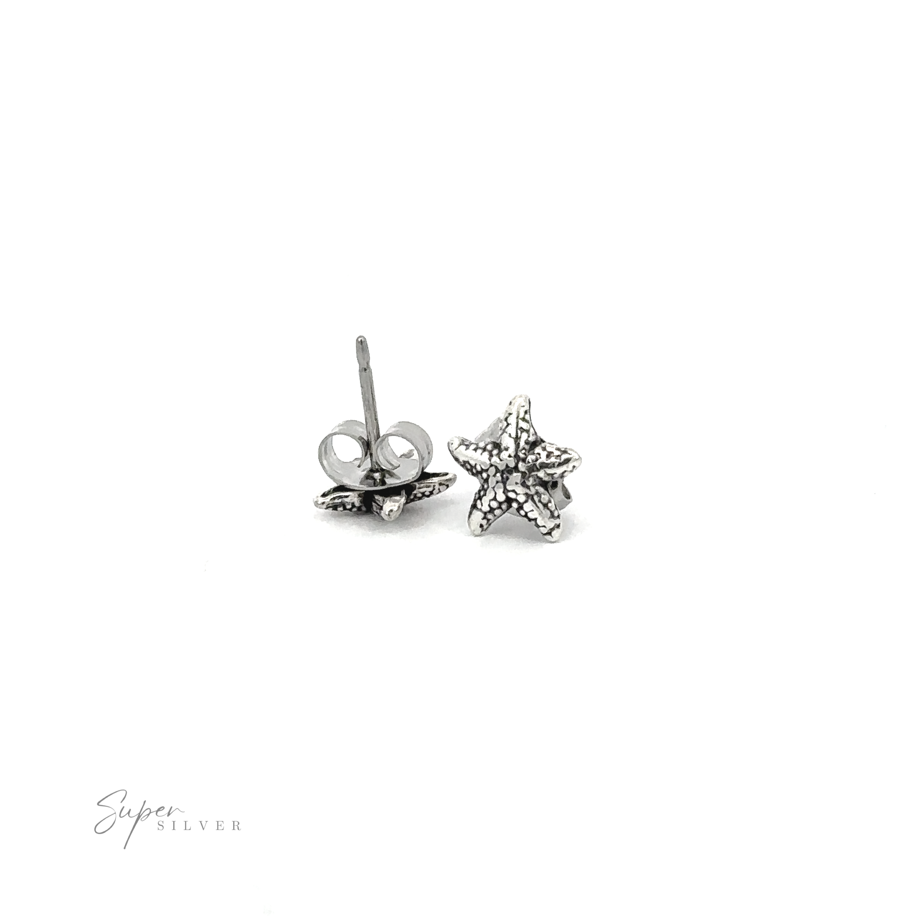 A pair of Star Fish Studs on a white background, perfect for coastal living and beach shores.