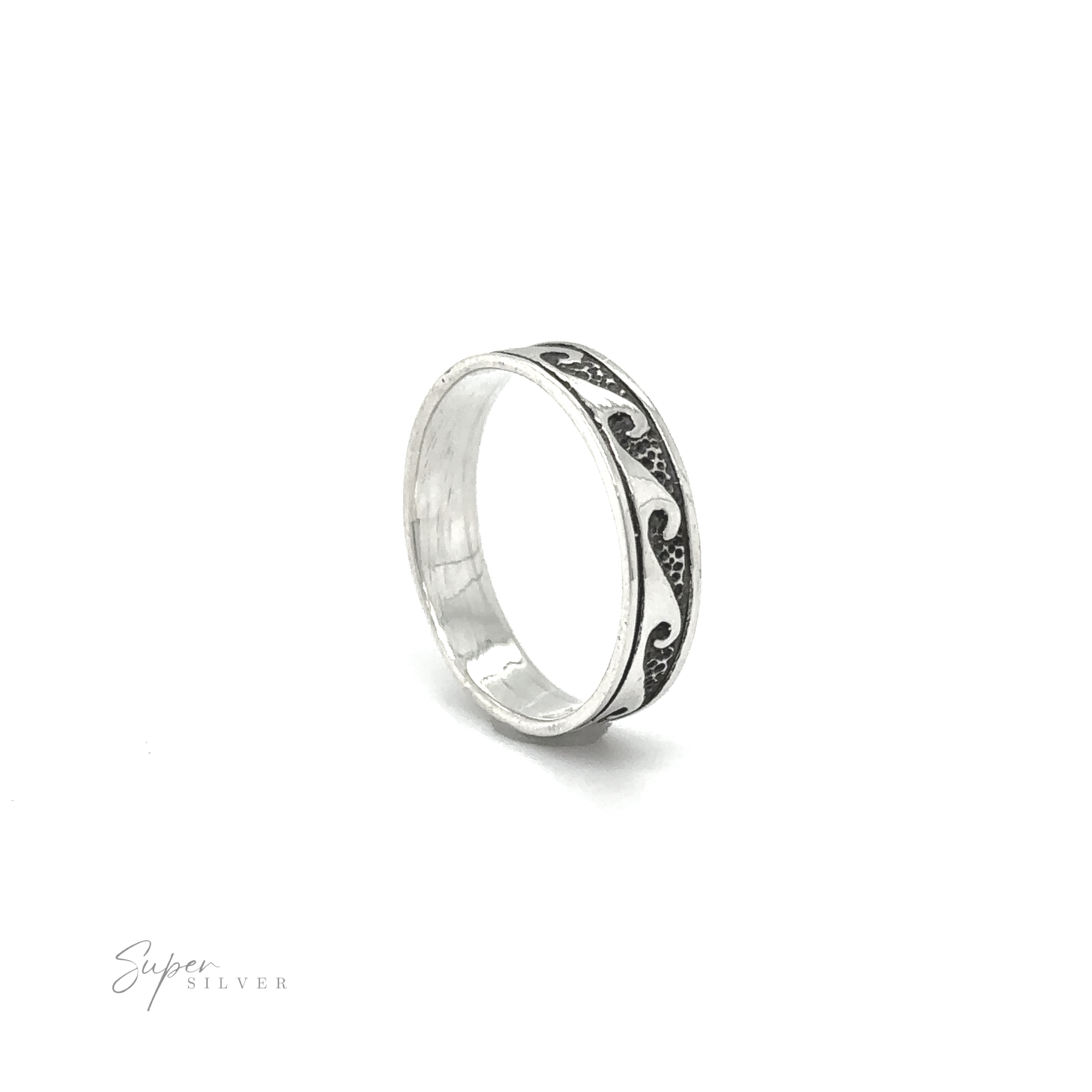 A silver 4mm Wave Band with a swirl design, inspired by the ocean.