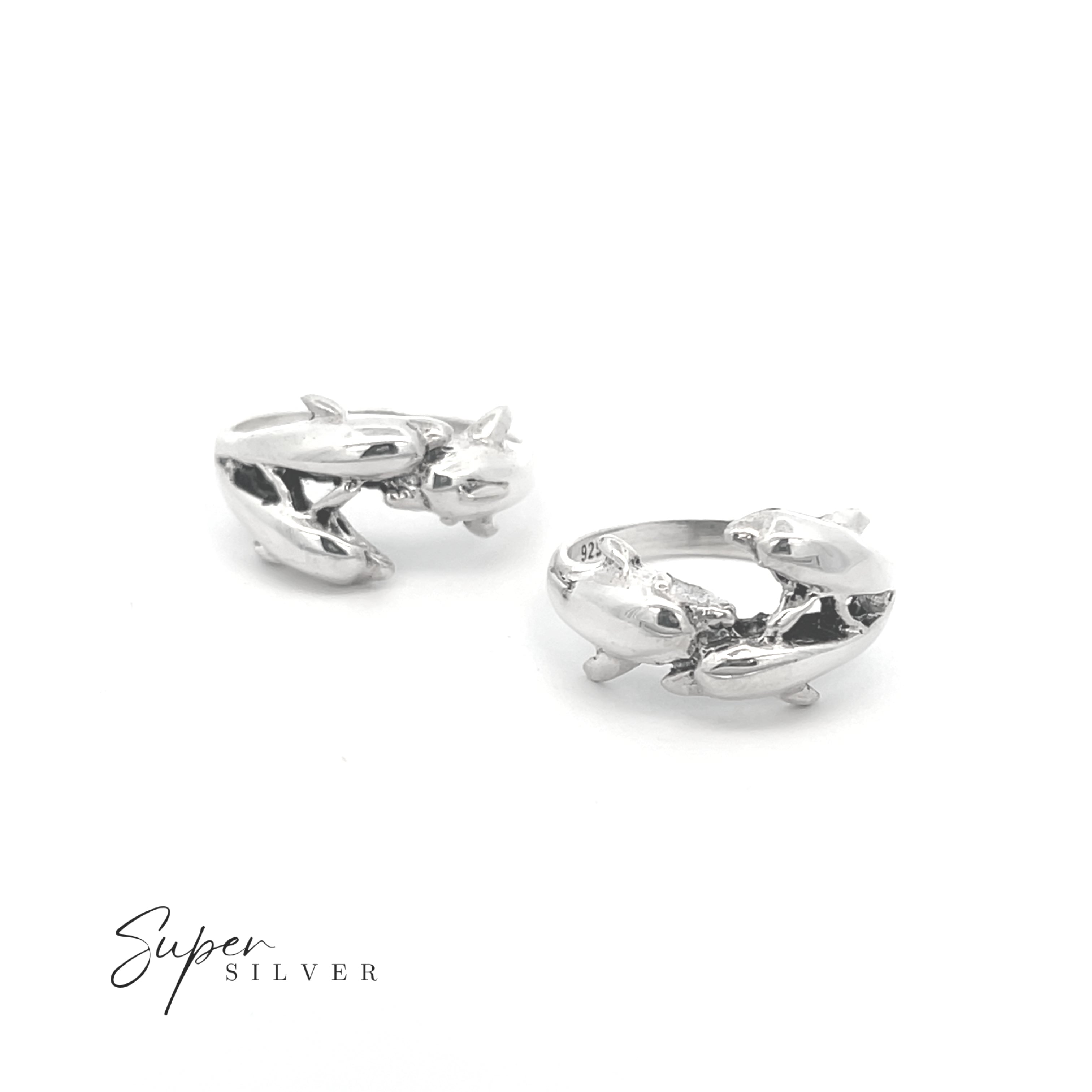Two Dolphin Pod Rings, ideal for ocean lovers, are shown on a white background with "Super Silver" in the lower left corner.