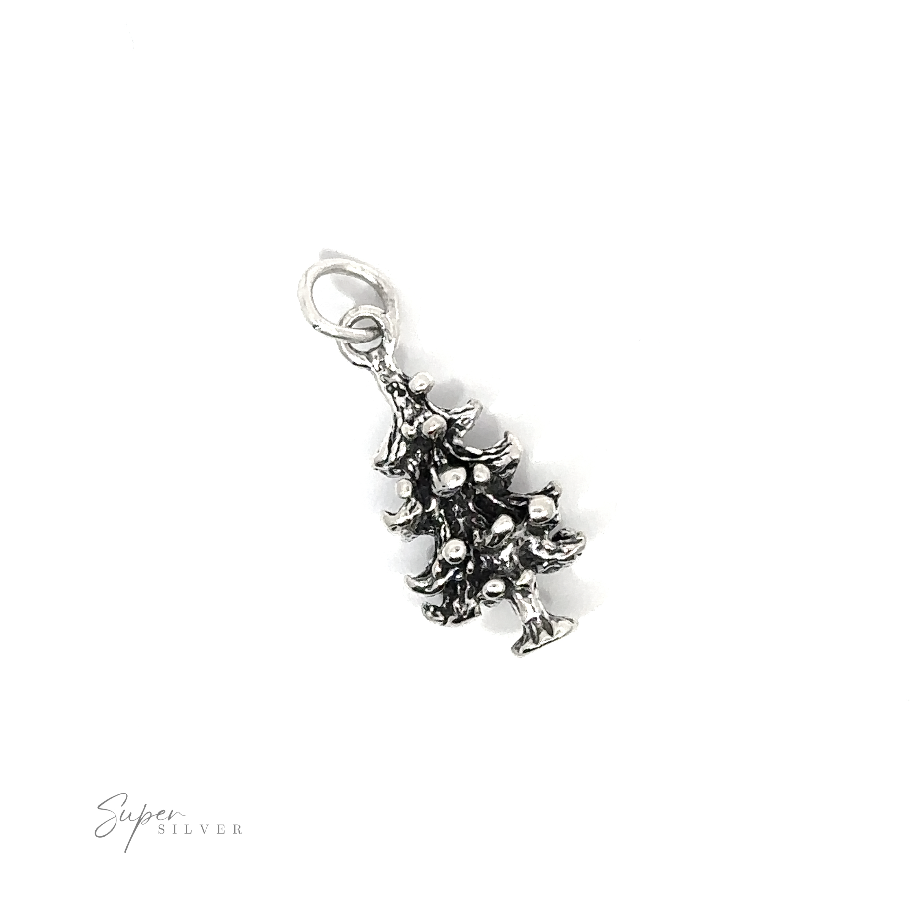 A Christmas Tree Charm on a white background.