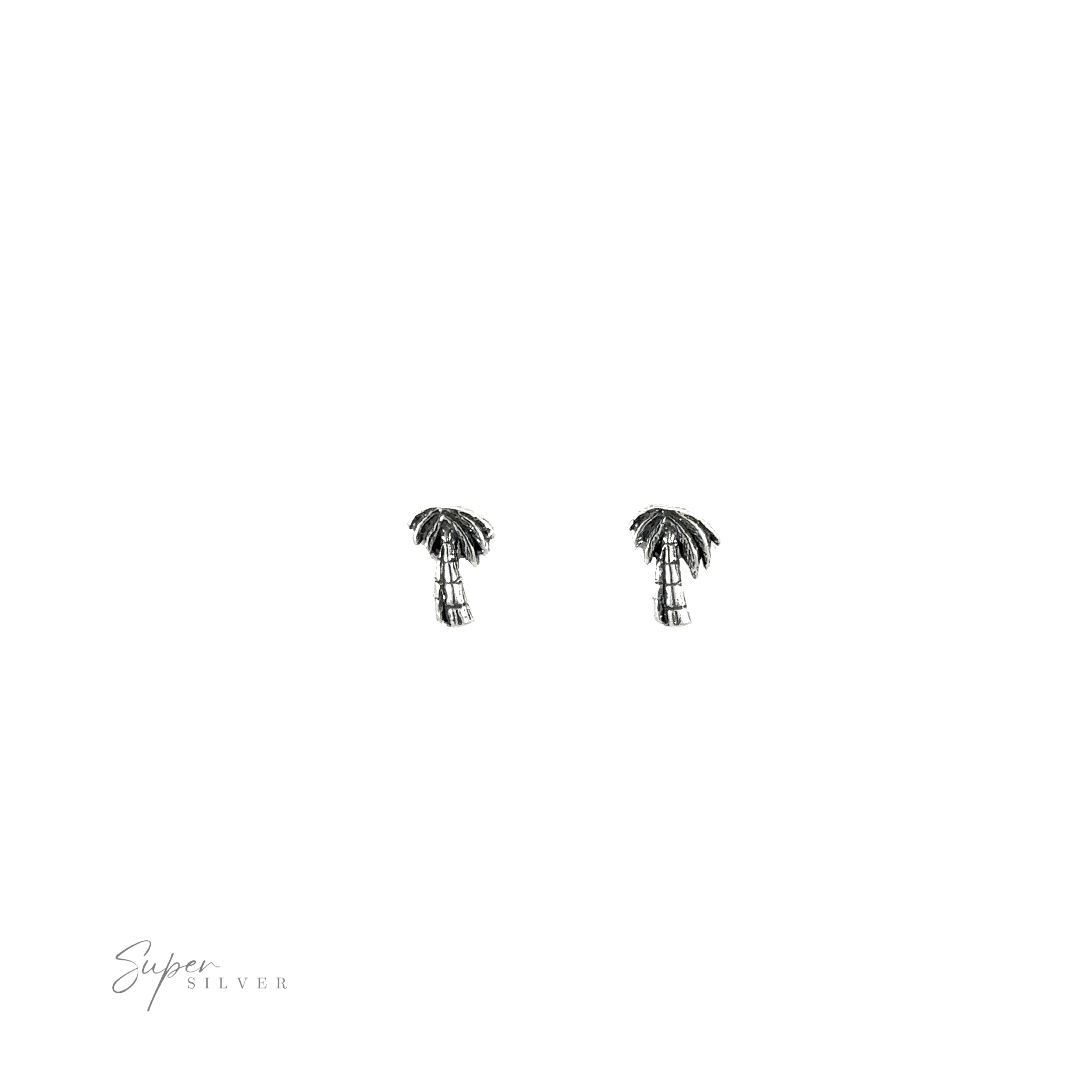 A pair of beautiful Palm Tree Studs in .925 sterling silver, placed on a serene white background.