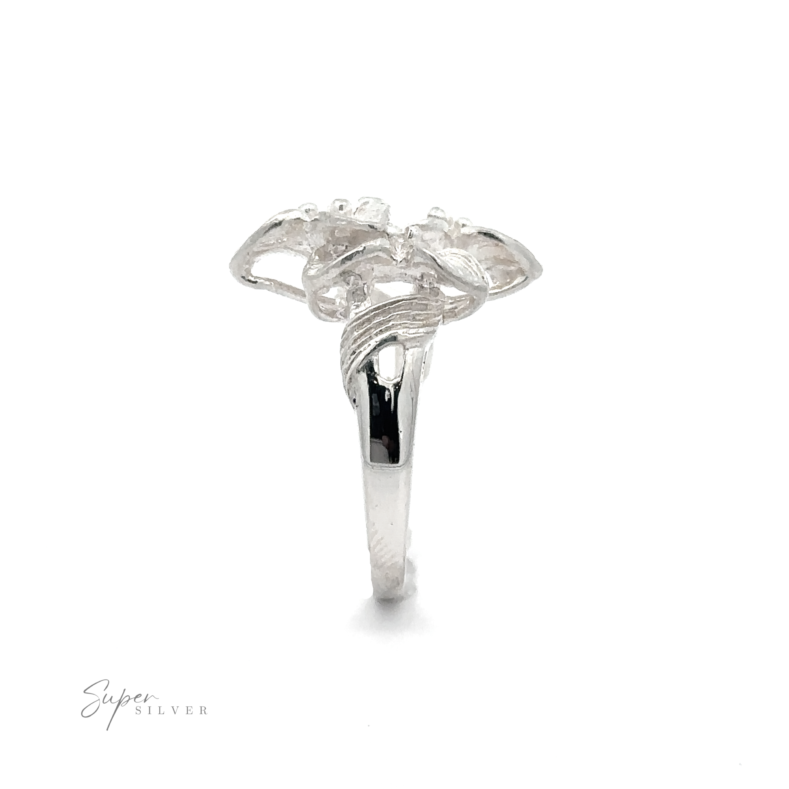 A Silver Ring with Three Flowers displayed against a white background.