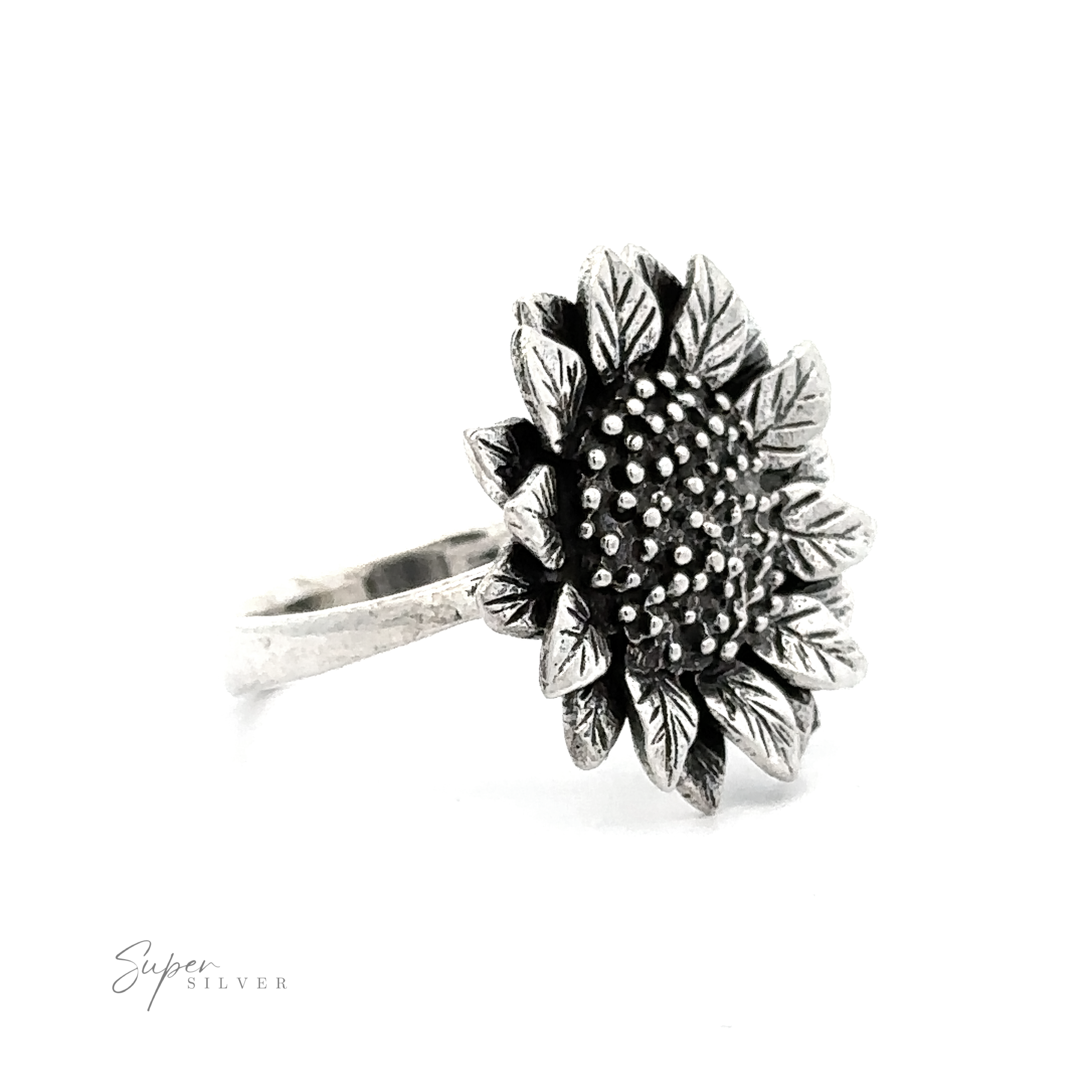 Sentence with product name: Large Sunflower Ring shaped like a sunflower with detailed petals and textured center on a white background.