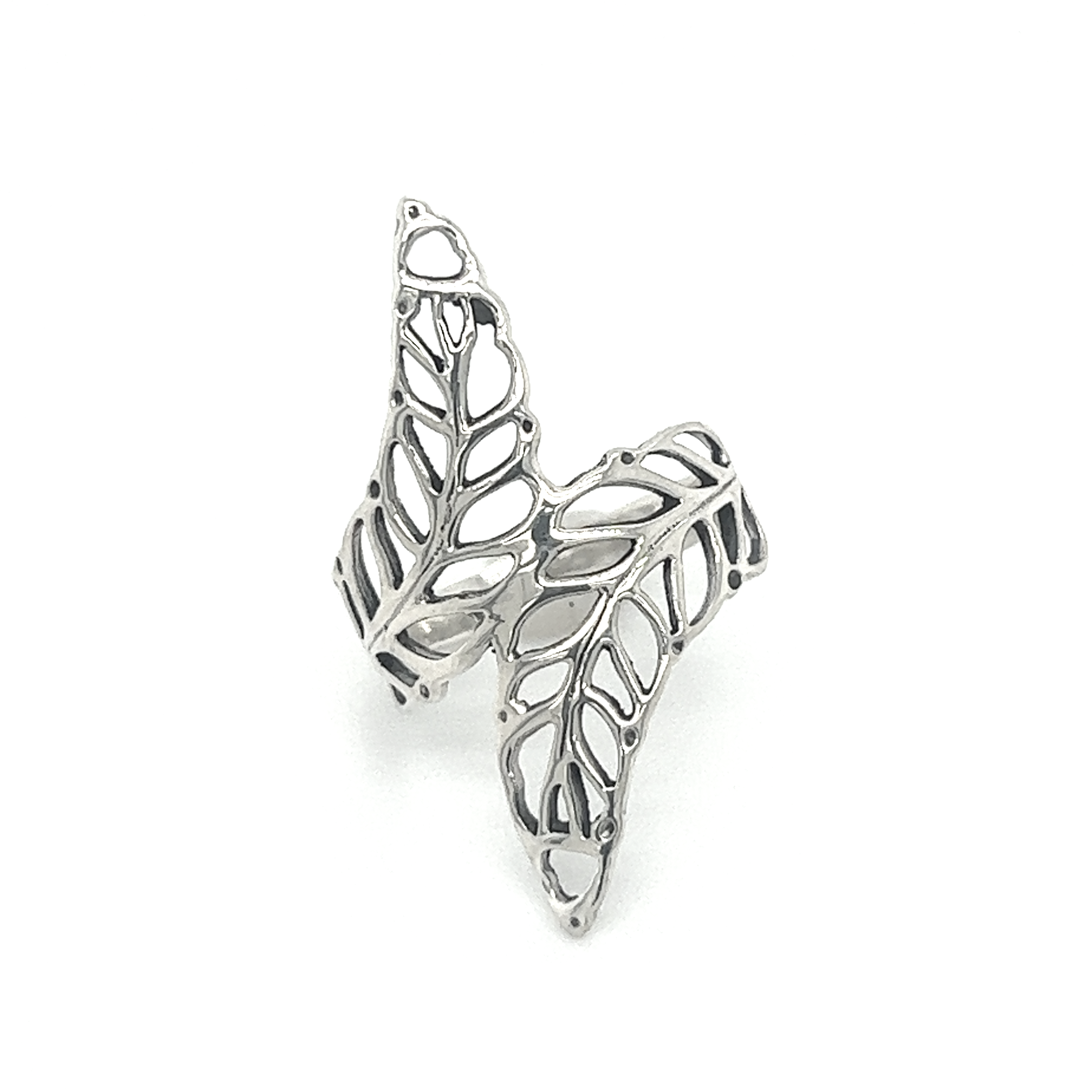 The Fern Outline Ring is a stunning silver ring with an intricate design, showcasing its organic beauty.