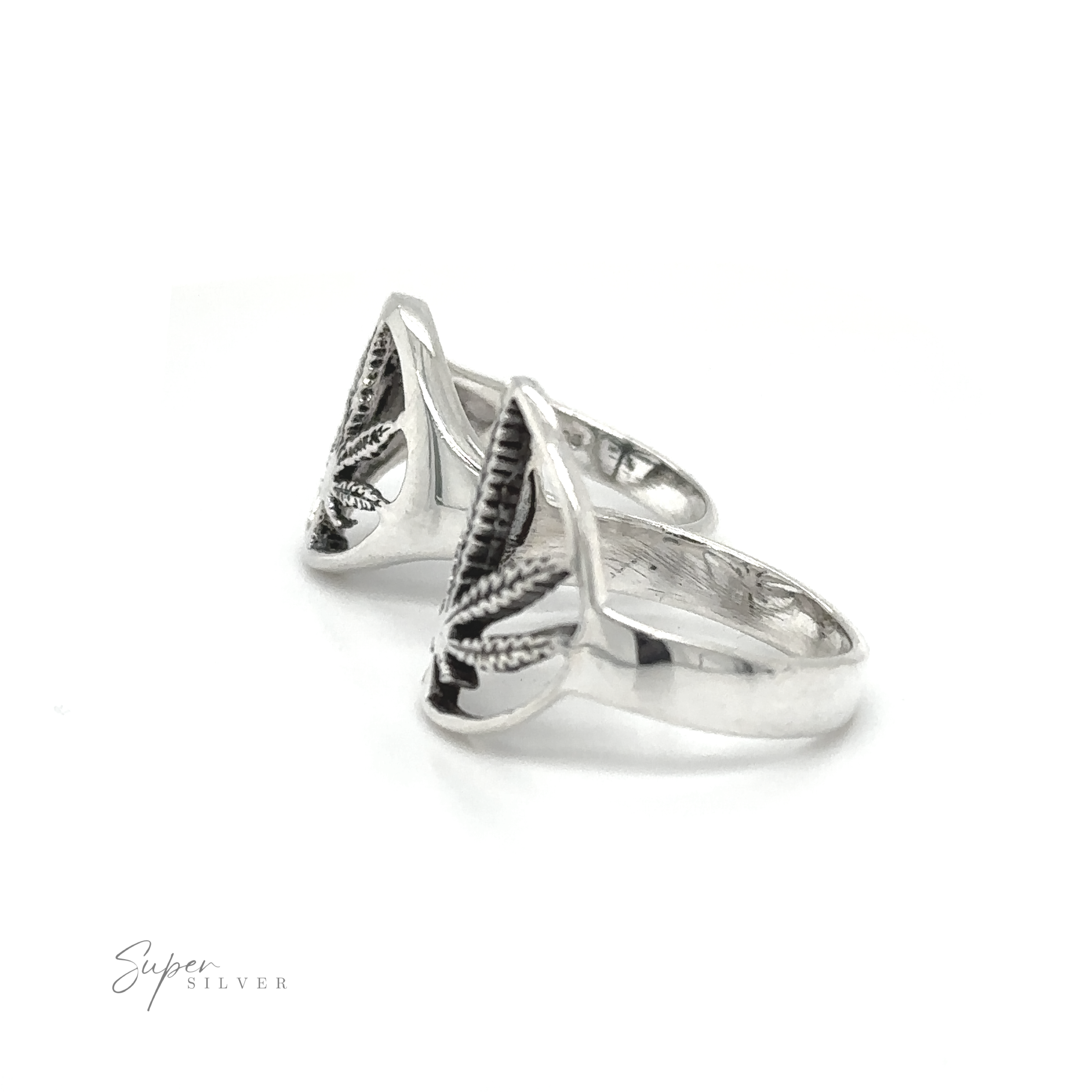 Outlined Mary Jane Leaf rings emanate Stoner vibes resting on a peaceful white background.