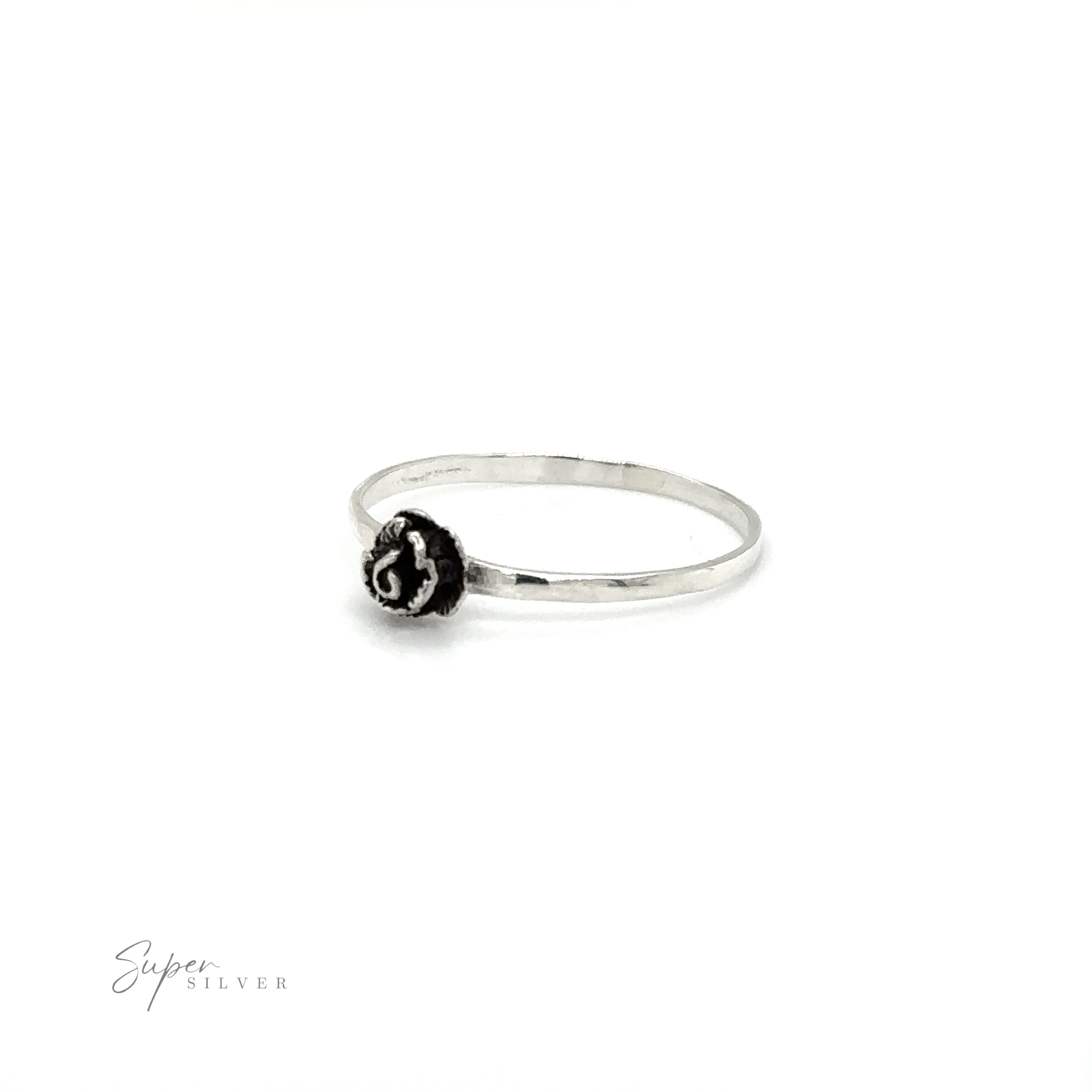 A Dainty Rose Ring with a floral design.