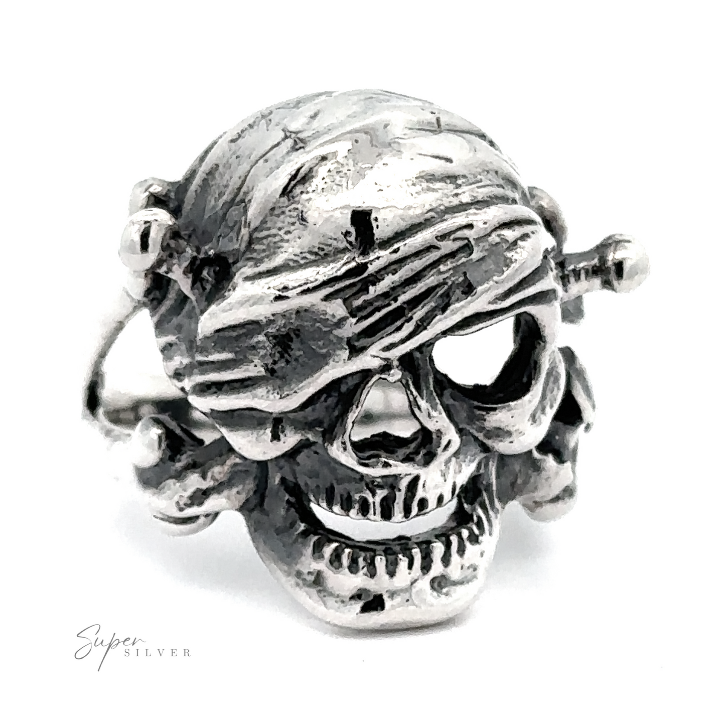 A Large Pirate Skull And Crossbones Ring with detailed carvings and a bandana, displayed on a white background.