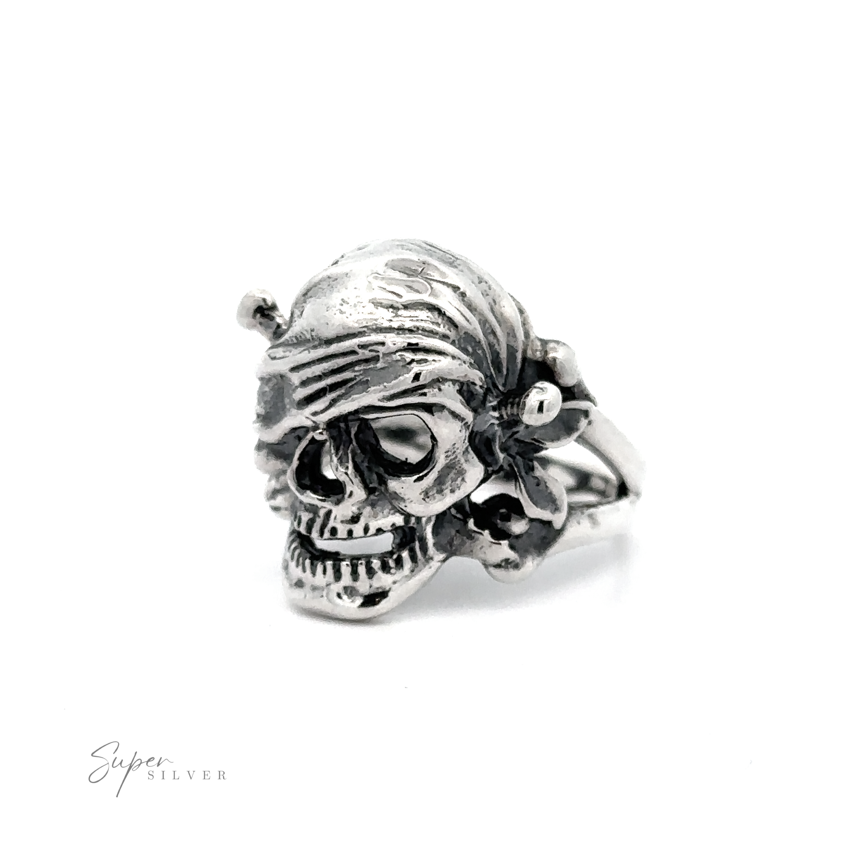 A Large Pirate Skull And Crossbones Ring with intricate details and polished finish, displayed on a white background.