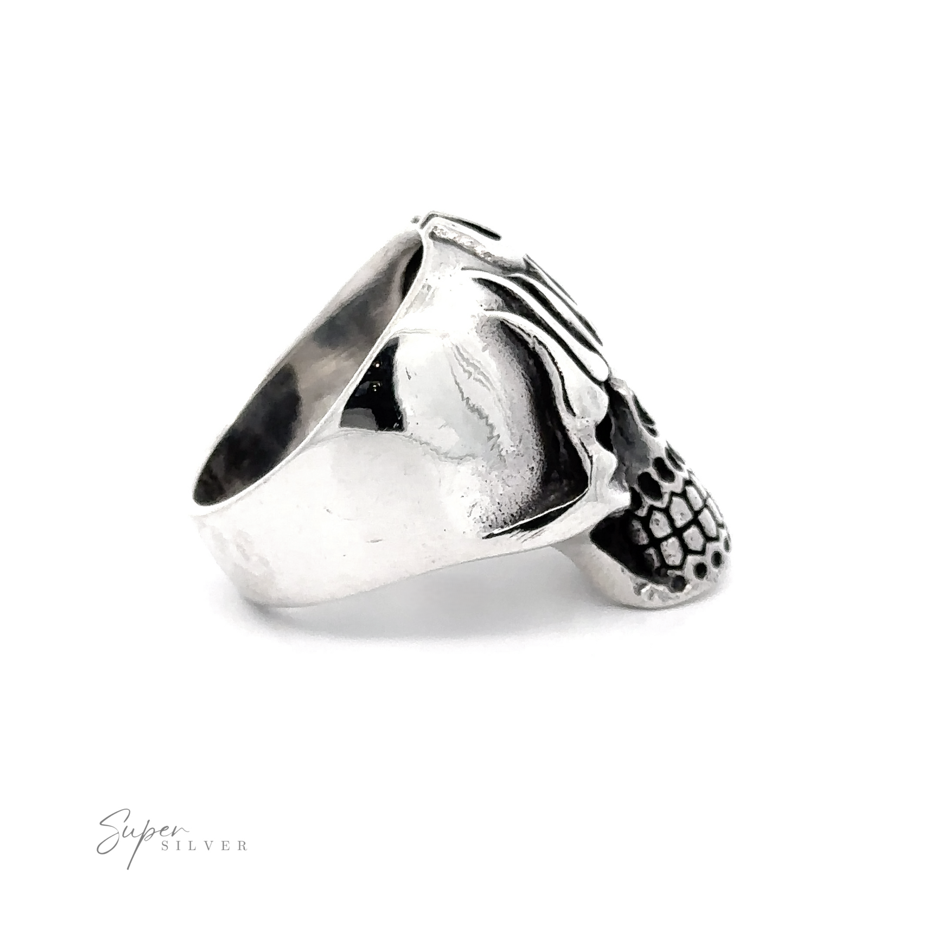 A stunning Flaming Skull Statement Ring featuring an intricate skull design on one side, with a polished finish. Crafted from .925 Sterling Silver, the brand name "Super Silver" is visible at the bottom left.