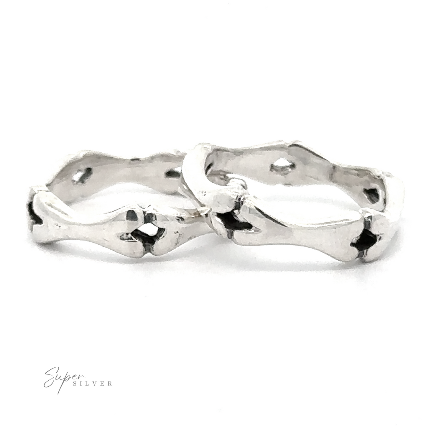 Silver Bones band ring with a bamboo-like design and black accent details on a white background.