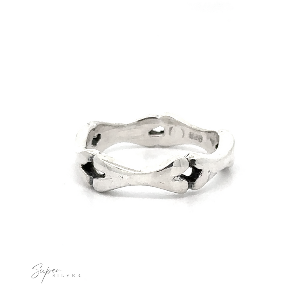 Silver Bones Band Ring with a twisted, open design, displayed on a white background.