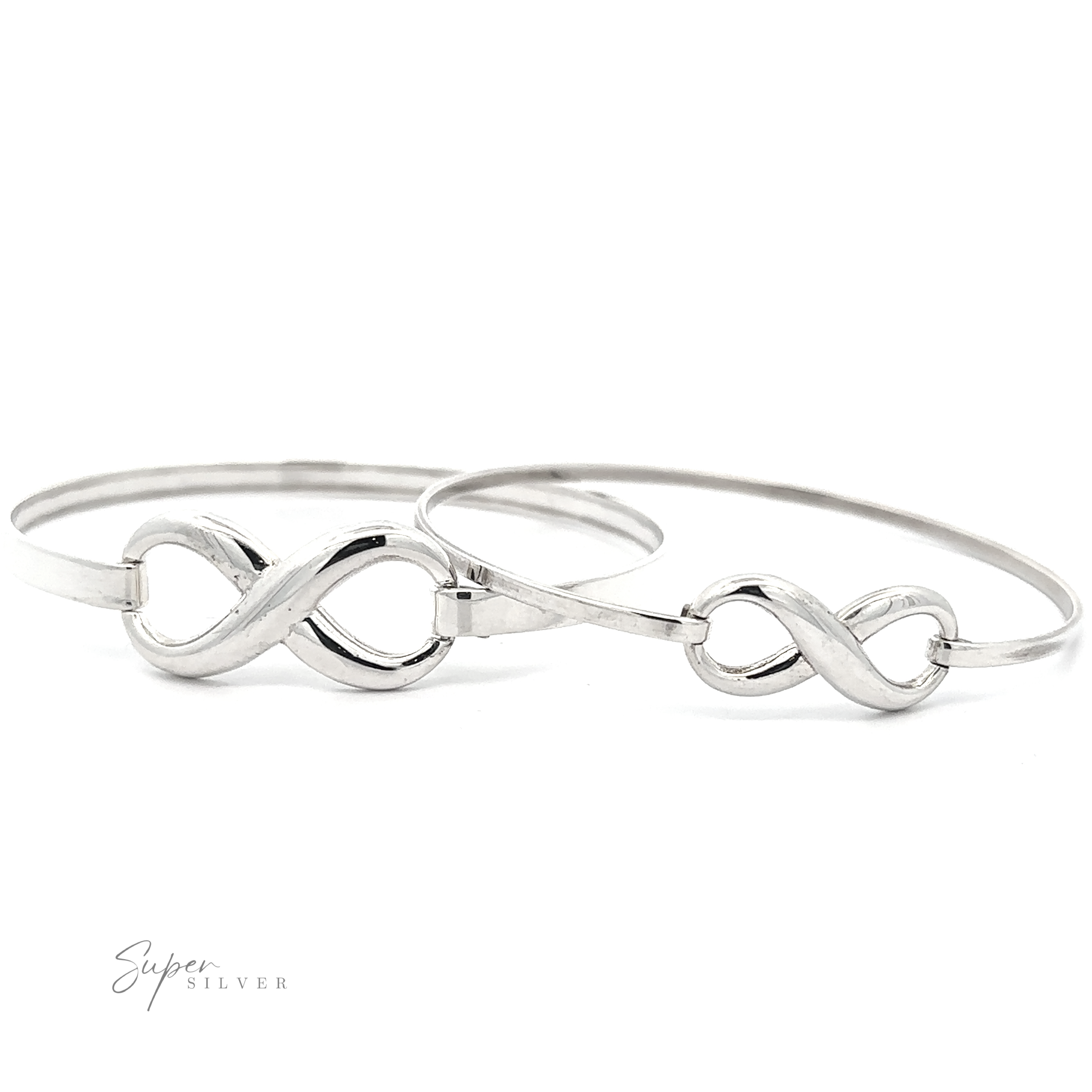 Two Infinity Bracelets are displayed side by side on a white background, each featuring a secure latch clasp, with a subtle "Super Silver" logo in the bottom left corner.