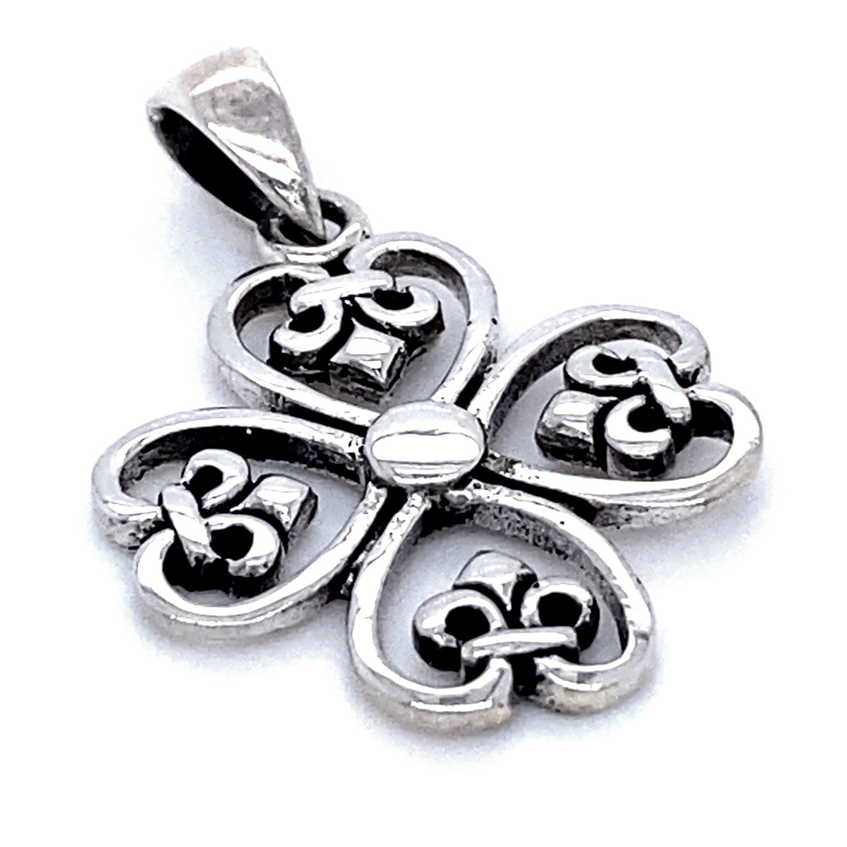 A Clover Cross Pendant with Fleur De Lis in the shape of a clover with intricate heart designs in the petals, exuding a vintage style.