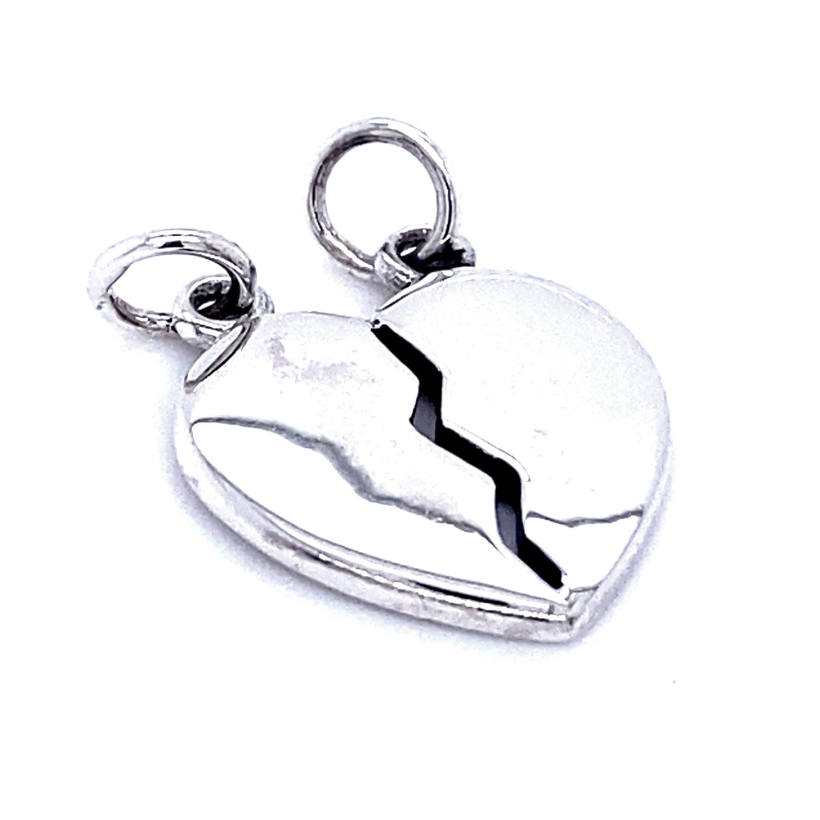 A sterling silver necklace featuring a customizable Plain Heart Break Apart Charm, intricately designed with a jagged black line down the middle to split into two separate pieces.