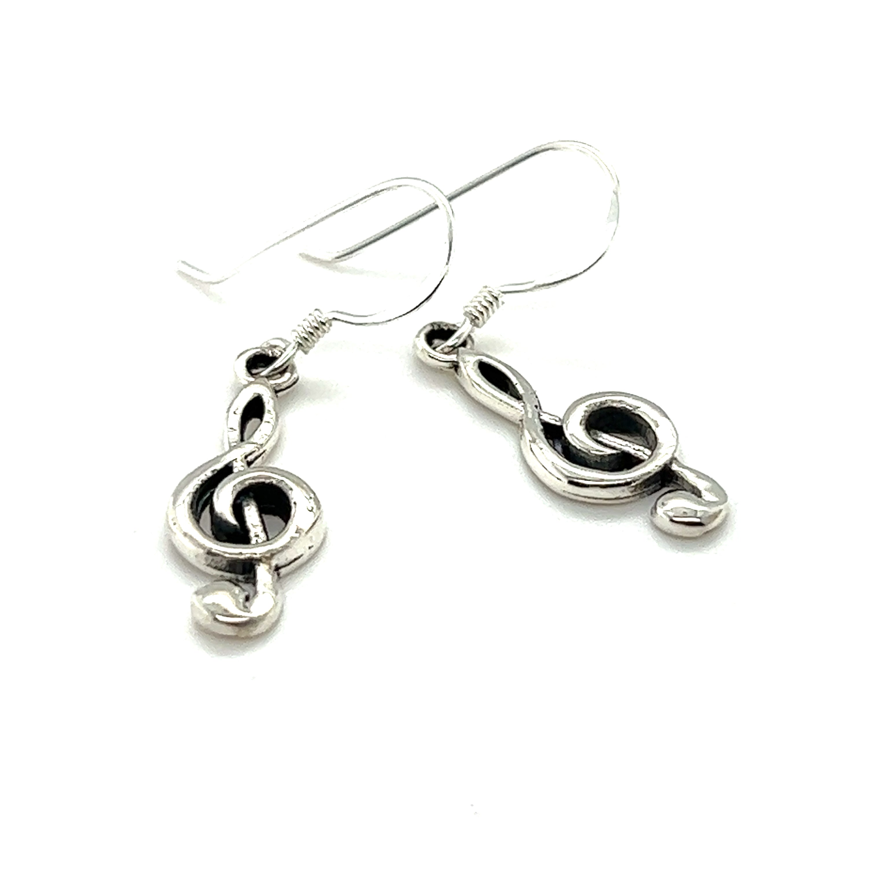 These Super Silver Treble Dangling Earrings are a must-have for music enthusiasts and musicians.