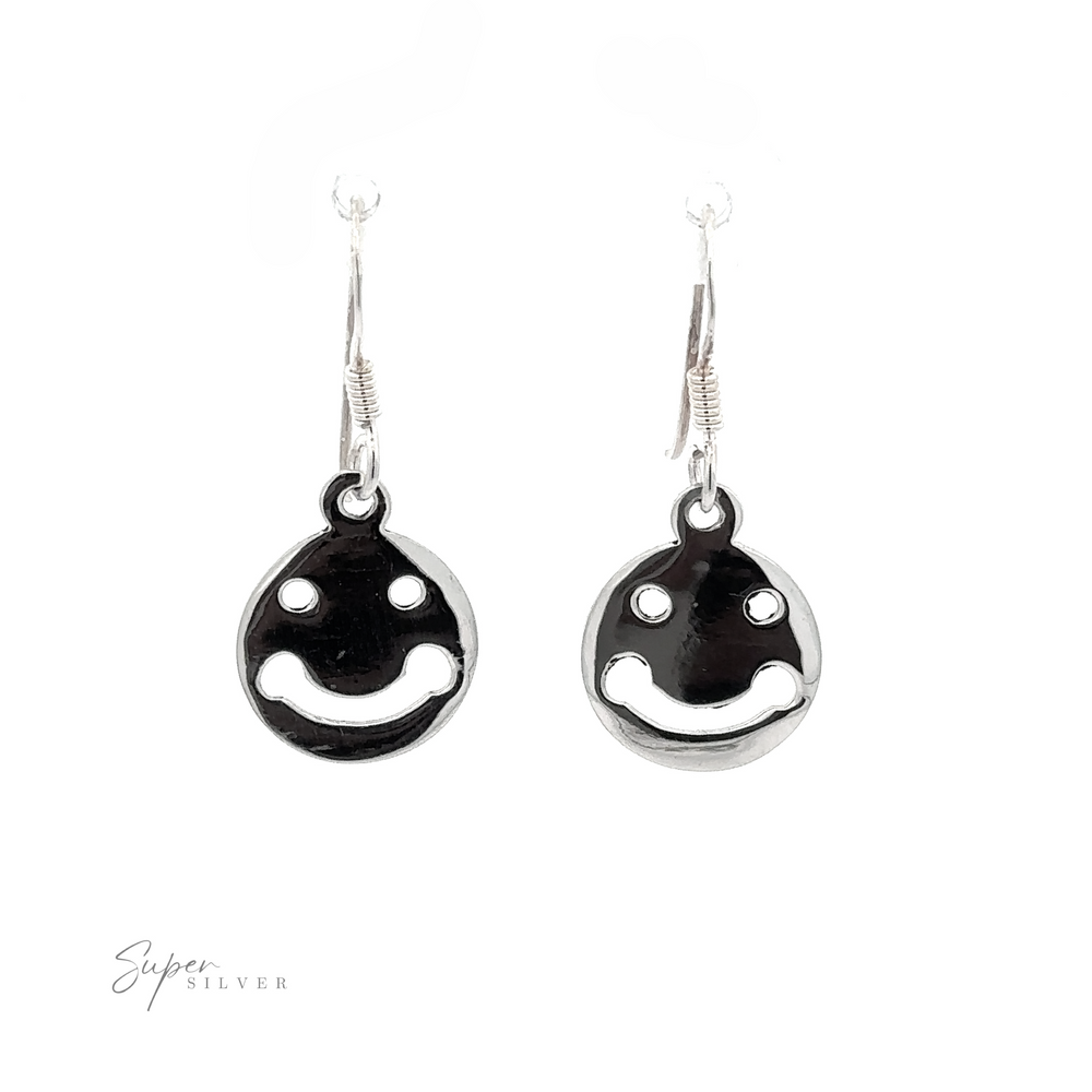 
                  
                    Sentence with Product Name: Trendy silver Smiley Face Earrings displayed against a white background.
                  
                