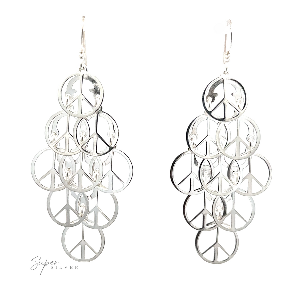 A pair of Layered Peace Sign Earrings with multiple interlocking circular designs, displayed against a white background with the text 