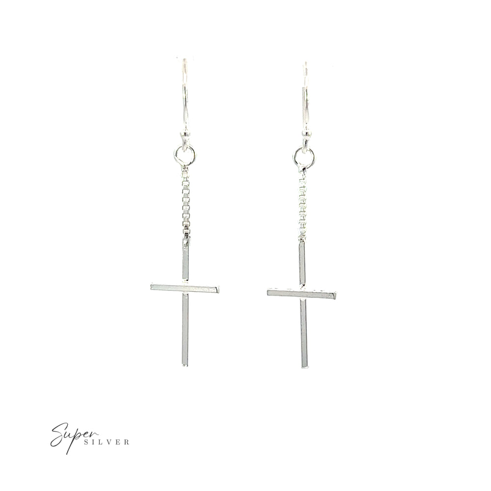 A pair of Minimalist Chain Cross Earrings crafted from .925 sterling silver, set against a white background.